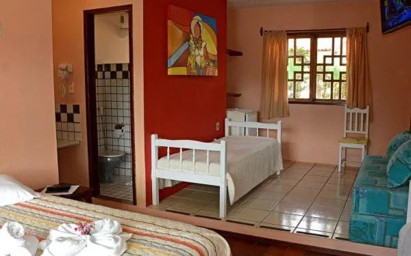 Bed in Pousada 4 Ventos