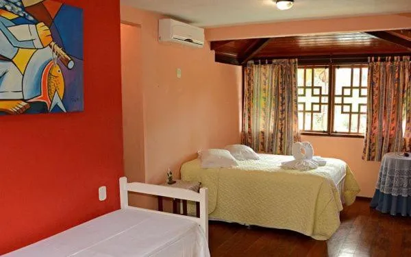 Bed in Pousada 4 Ventos