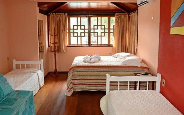 Bed in Pousada 4 Ventos