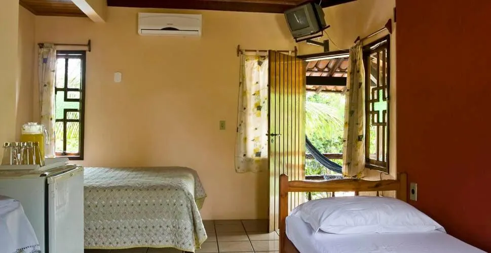 Bed in Pousada 4 Ventos
