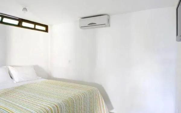 Bed in Pousada 4 Ventos
