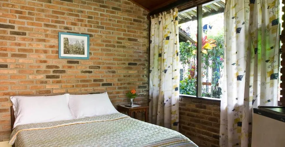 Bed in Pousada 4 Ventos