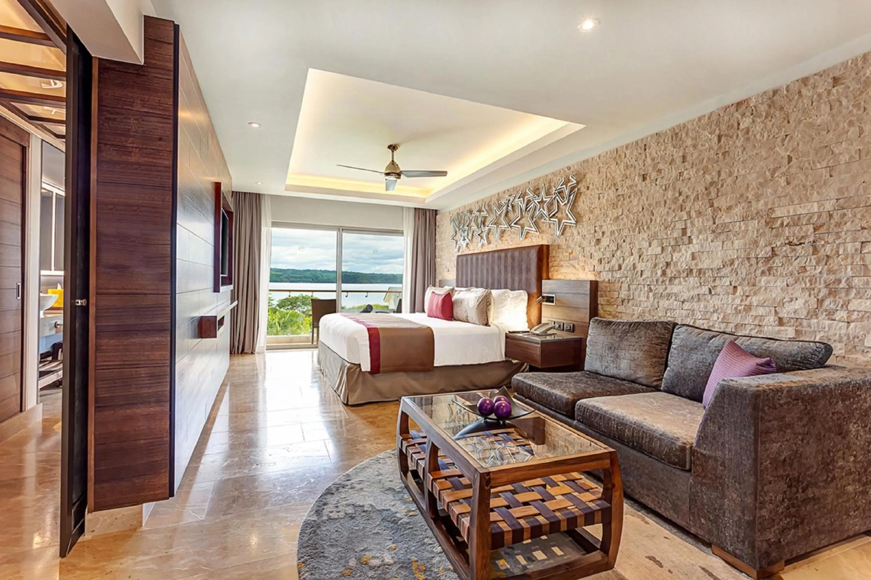 Living room, Bed in Planet Hollywood Costa Rica by Royalton, An Autograph Collection All-Inclusive Resort