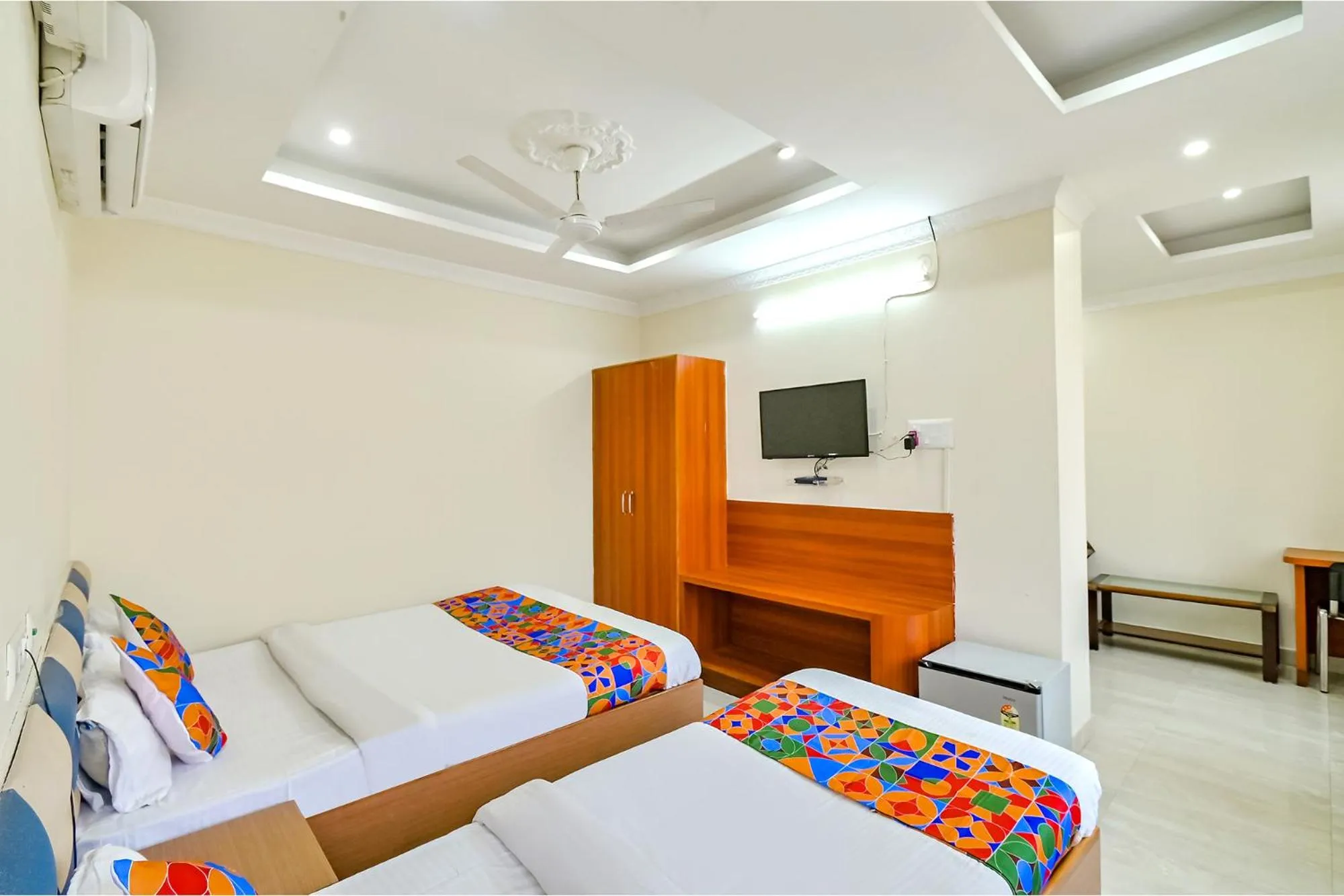 Bed in FabHotel Good Luck Residency