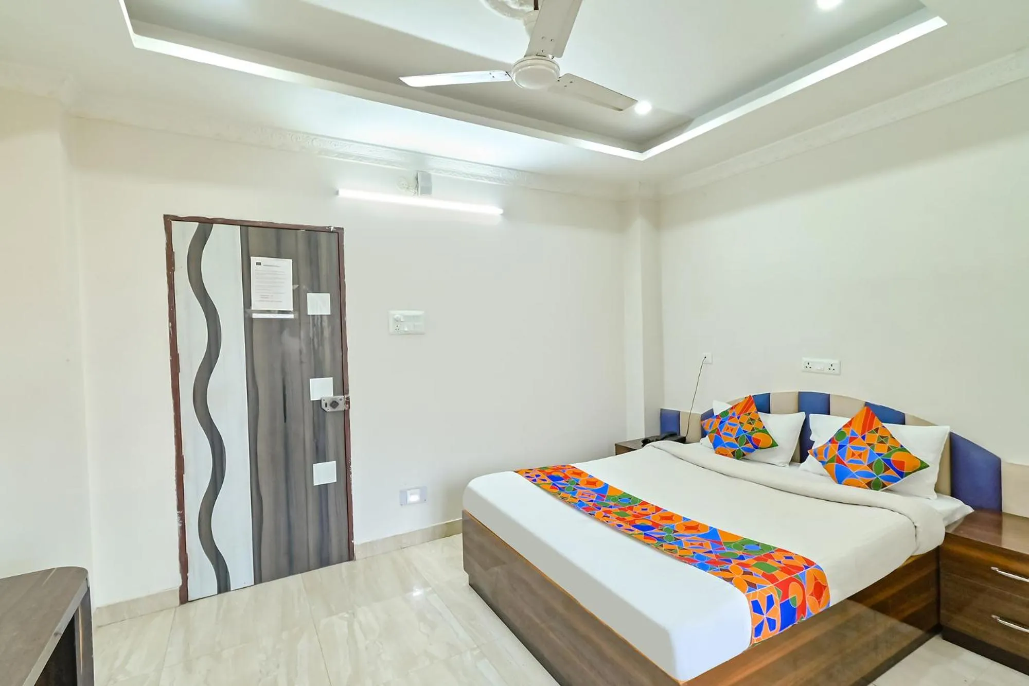 Bed in FabHotel Good Luck Residency