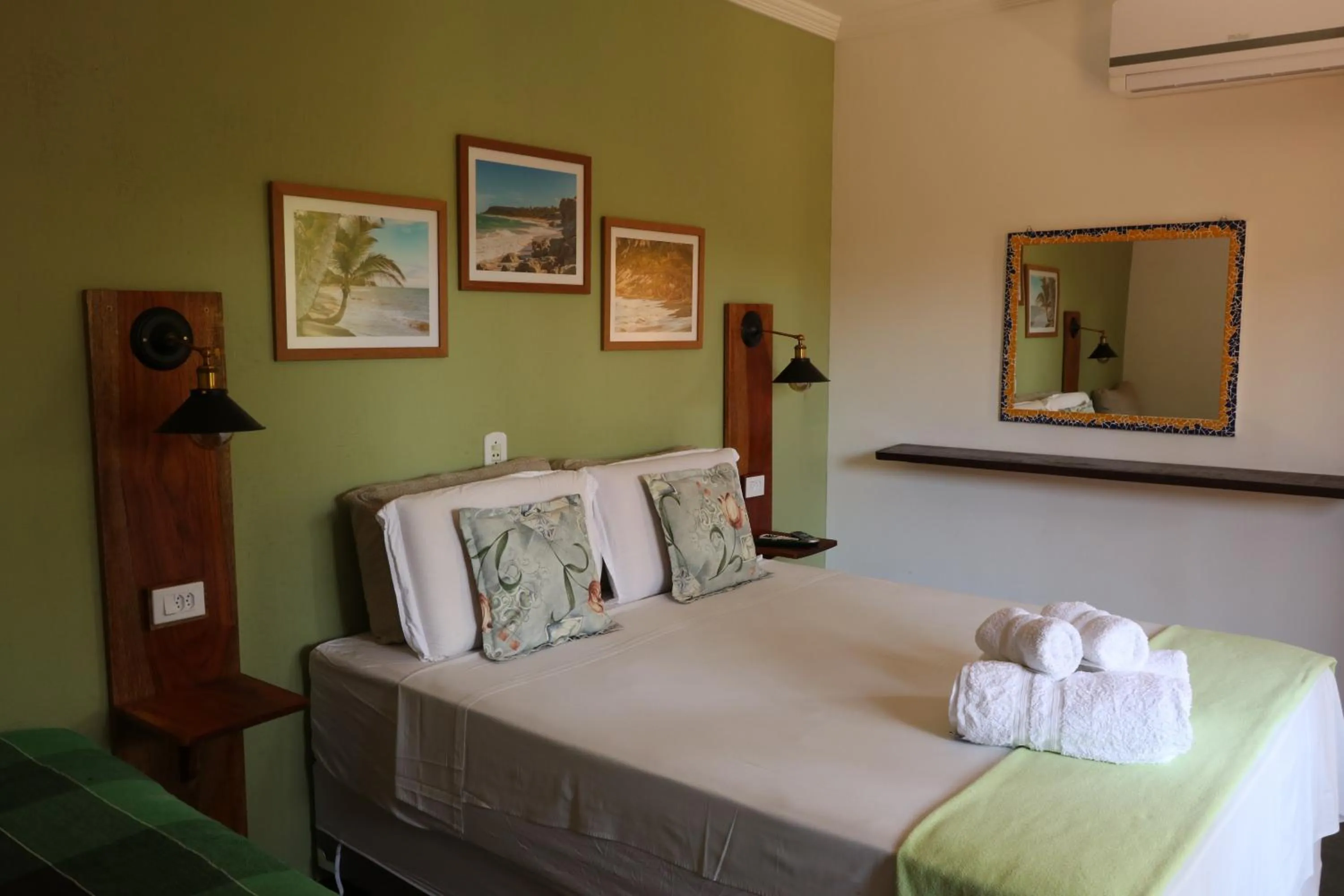 Bed in Pousada Catamara