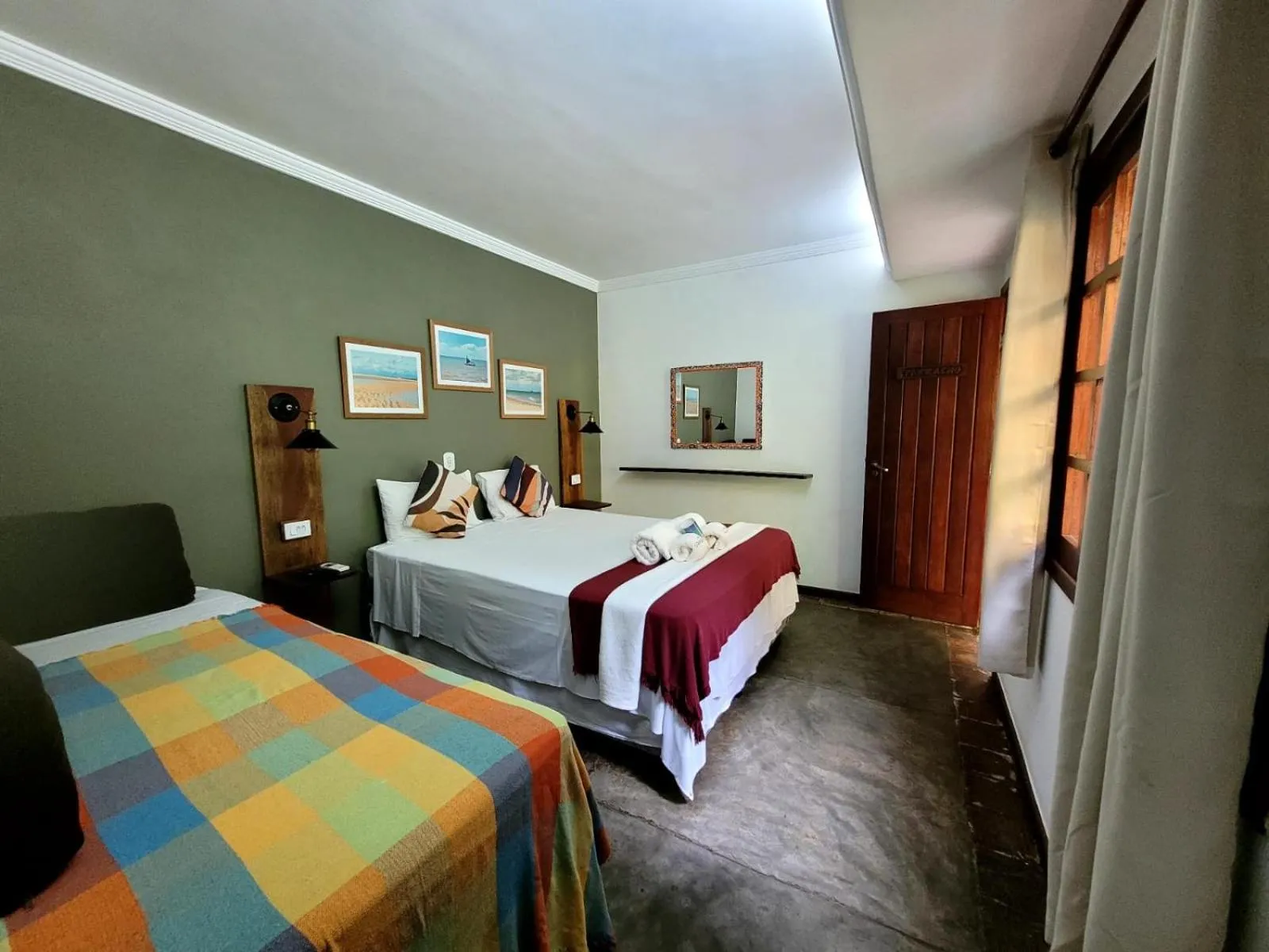 Bed in Pousada Catamara