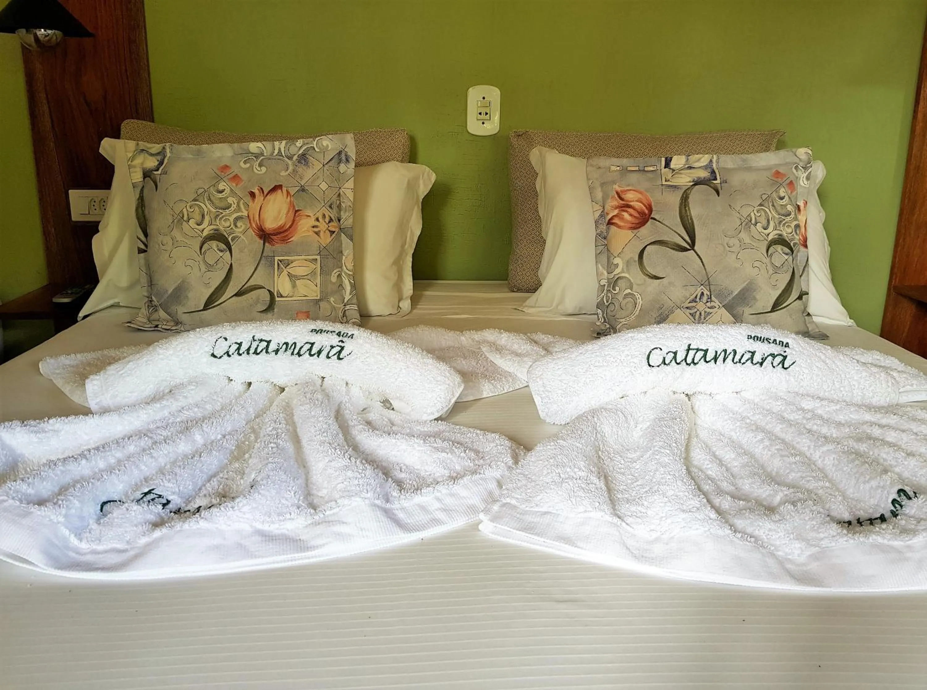 Bed in Pousada Catamara