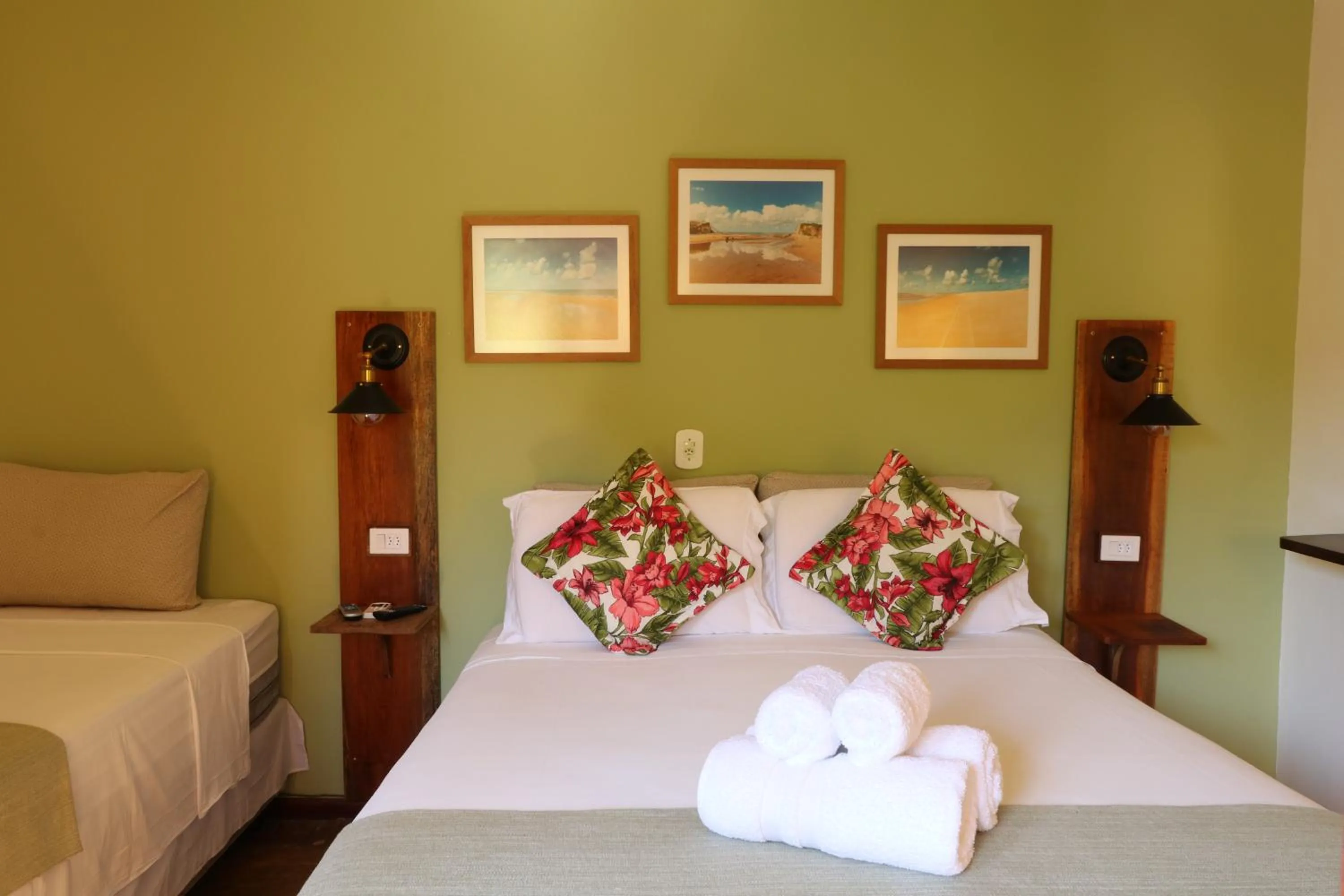 Bed in Pousada Catamara