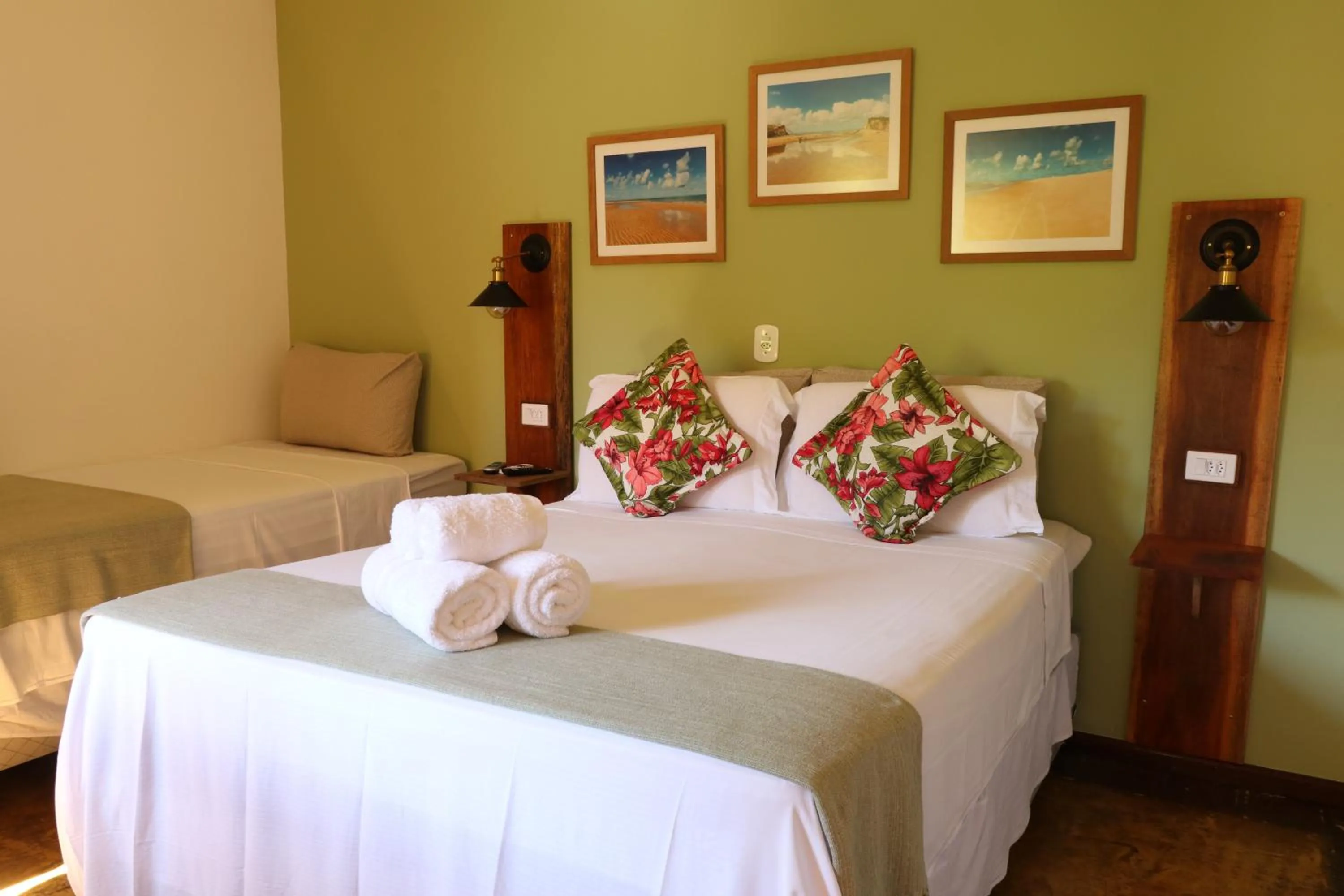 Bed in Pousada Catamara