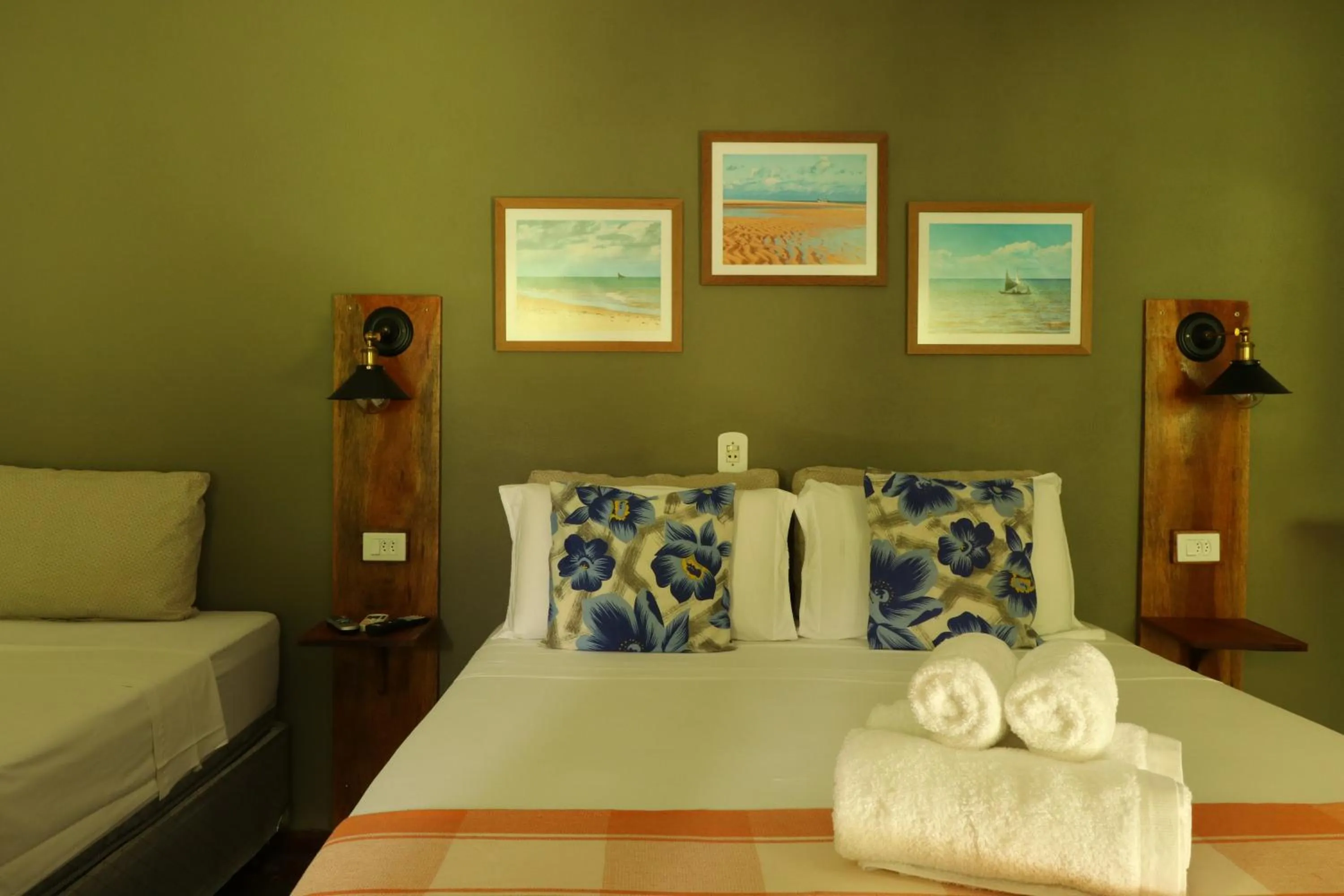 Bed in Pousada Catamara