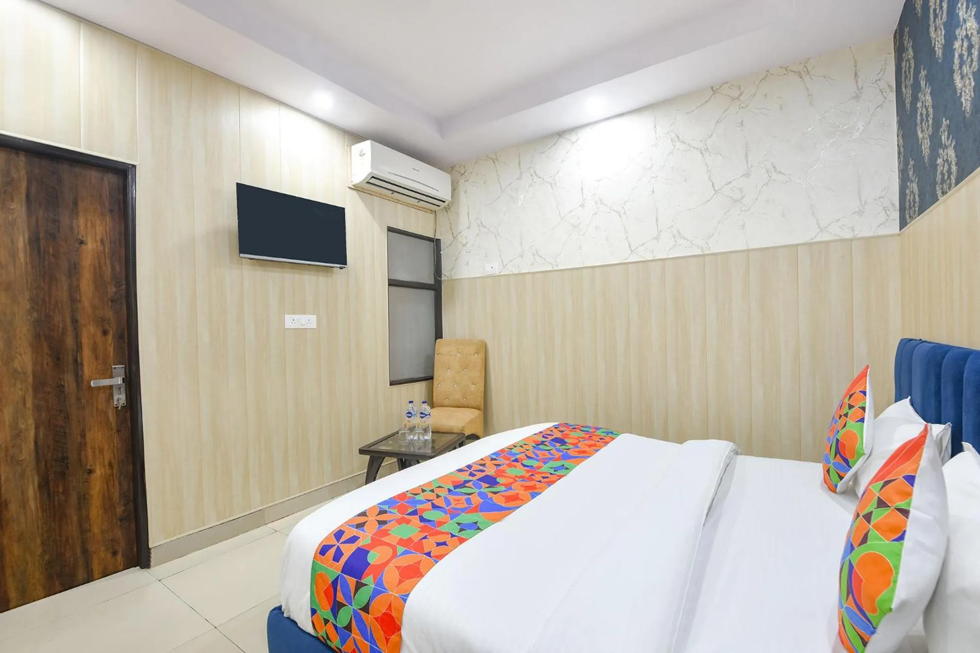 Bed in FabHotel Crown Residency