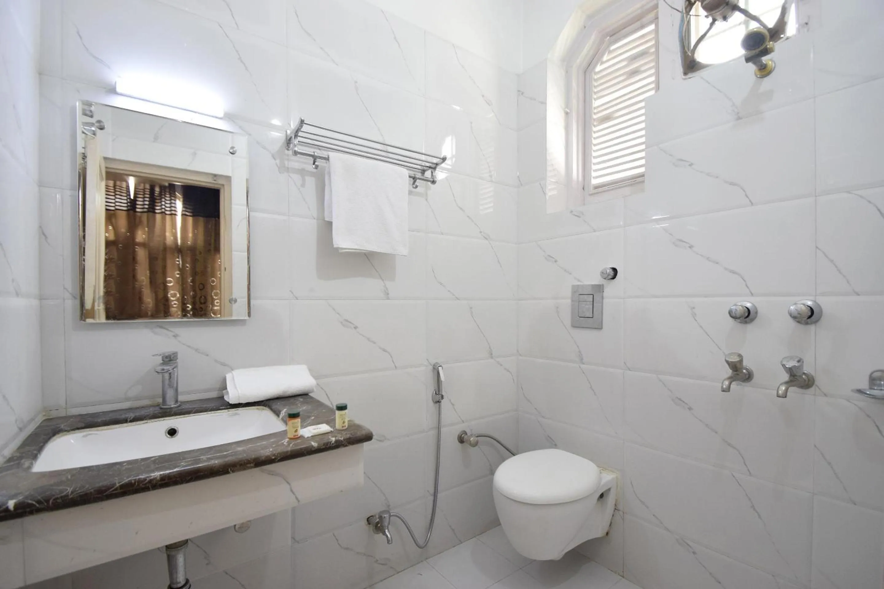 Bathroom in Hotel O Maa Residency