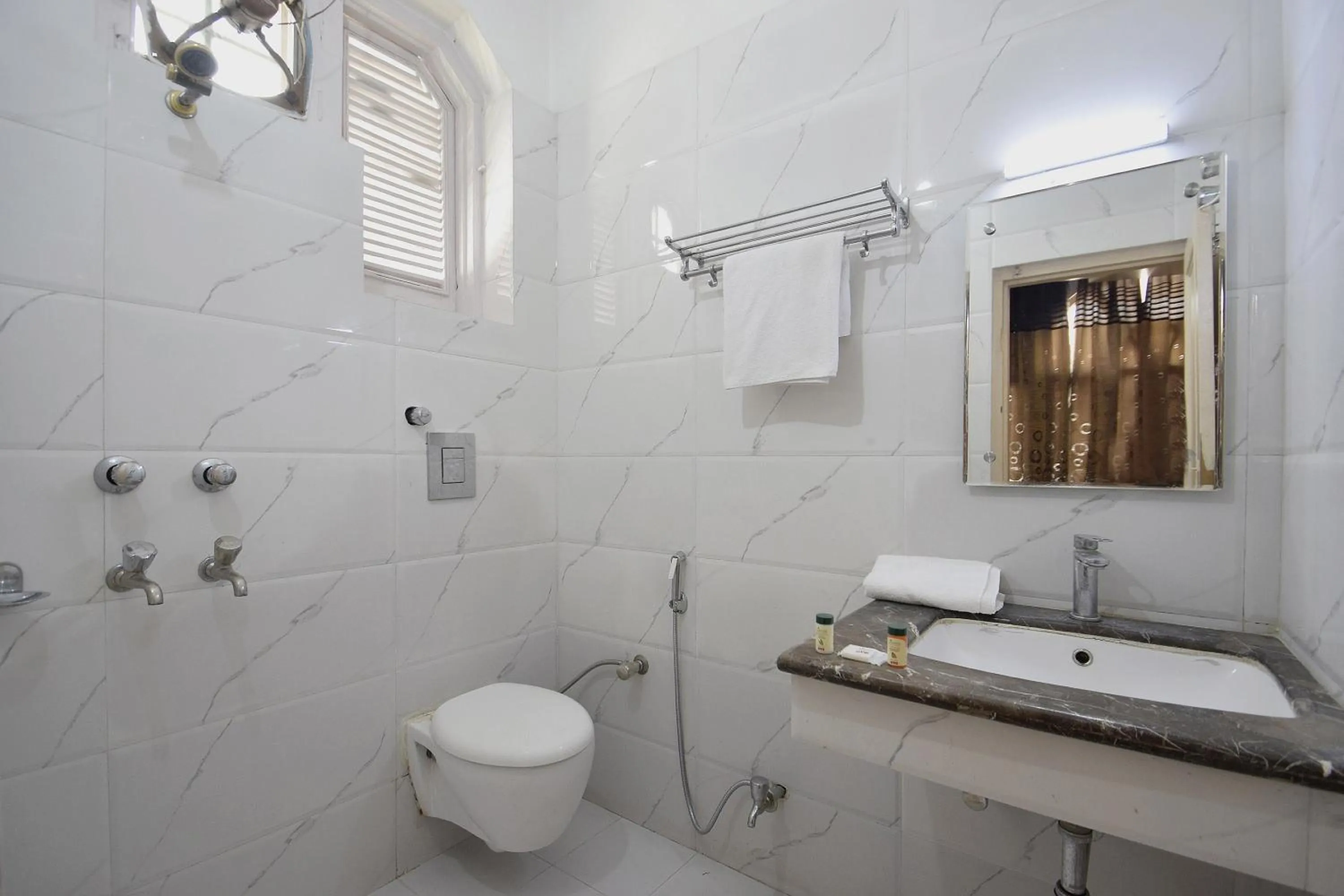 Bathroom in Hotel O Maa Residency