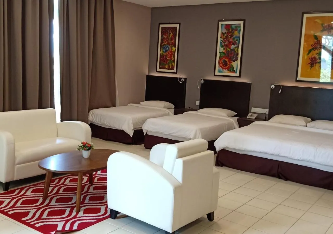 Living room, Bed in Hotel Desaru Penawar