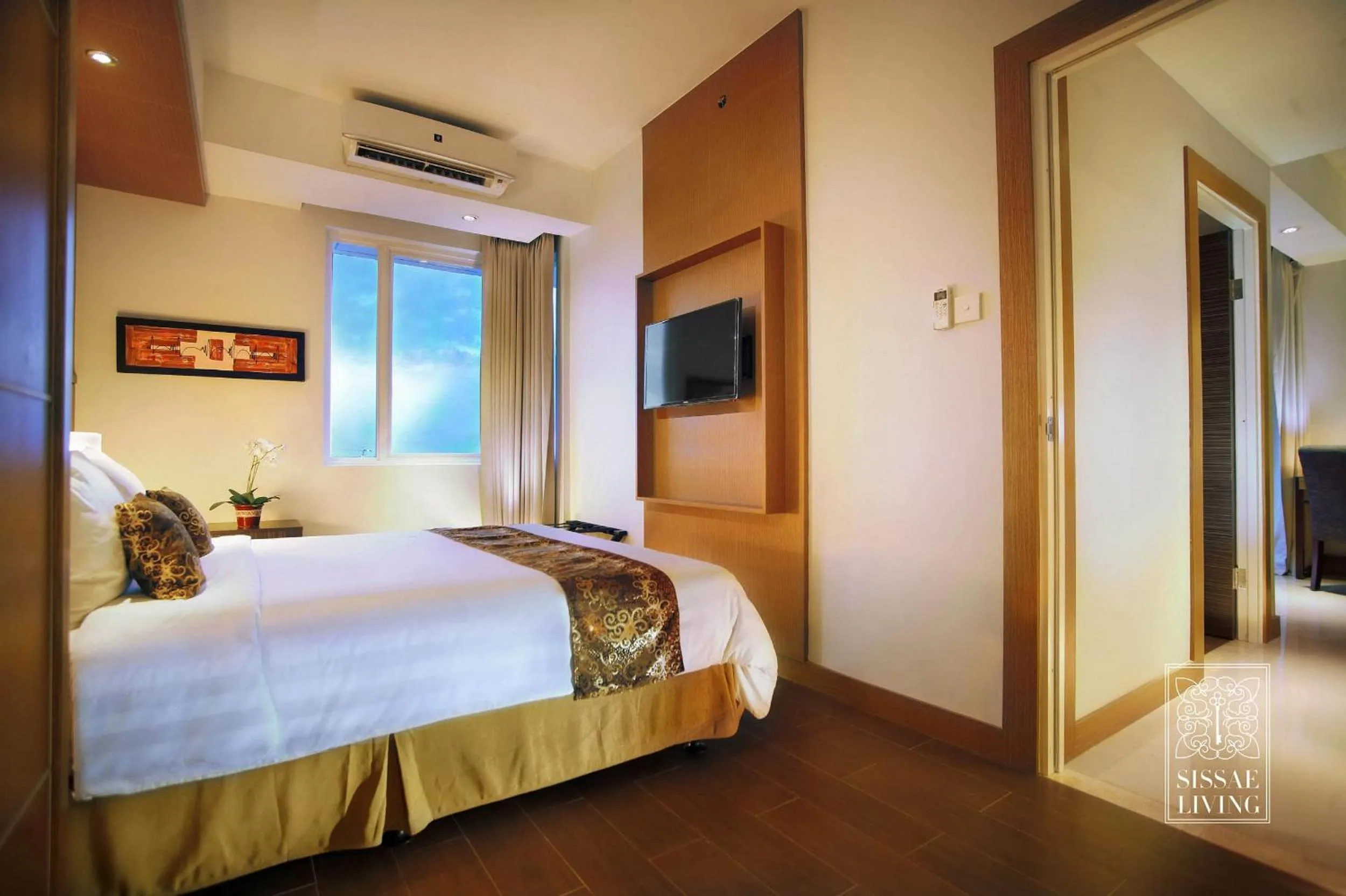 Bed in The Malibu Suites Balikpapan by Sissae Living