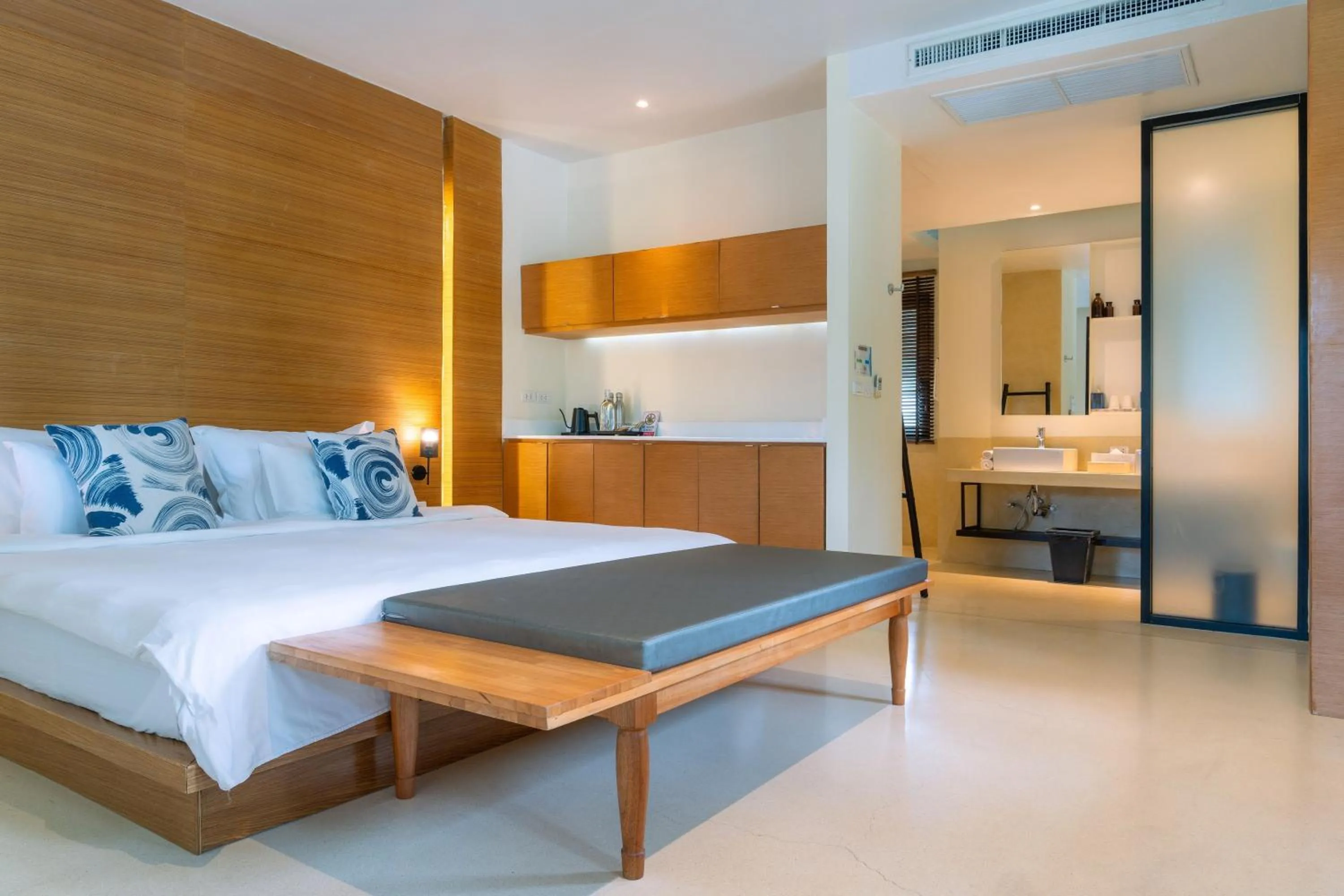 Bed in The Anda Mani Khaolak Beachfront Villas