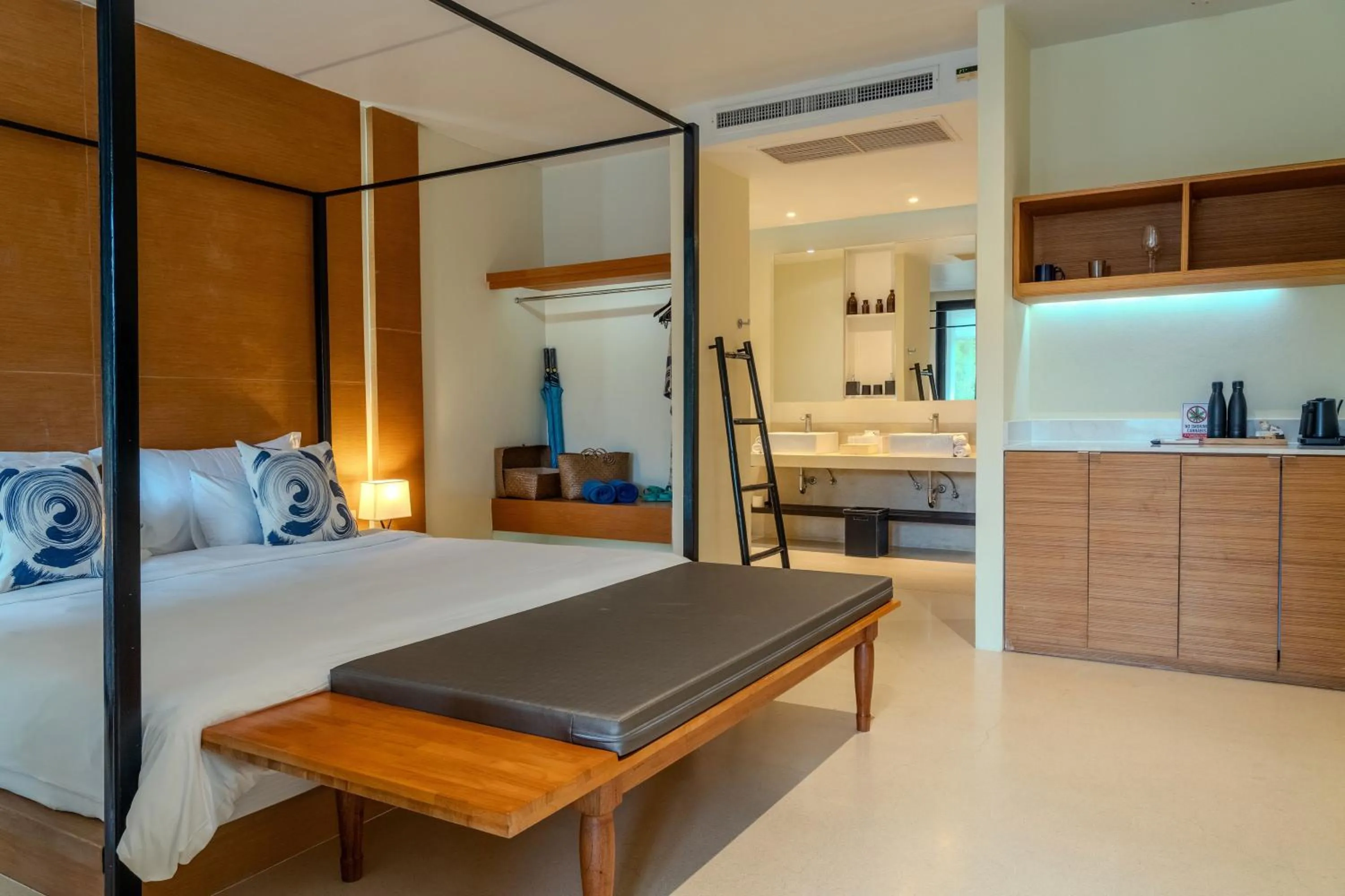 Bed in The Anda Mani Khaolak Beachfront Villas