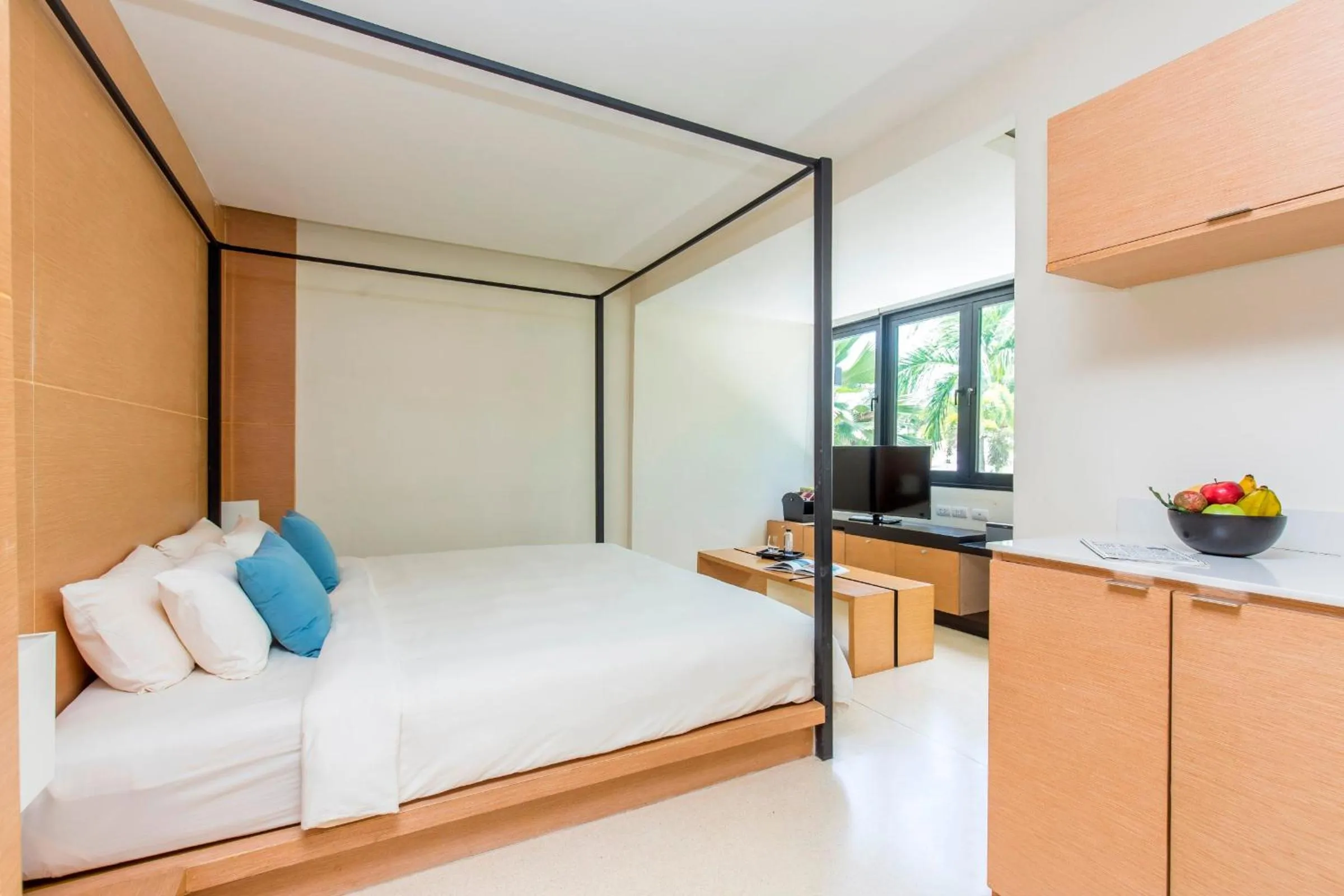 Bed in The Anda Mani Khaolak Beachfront Villas