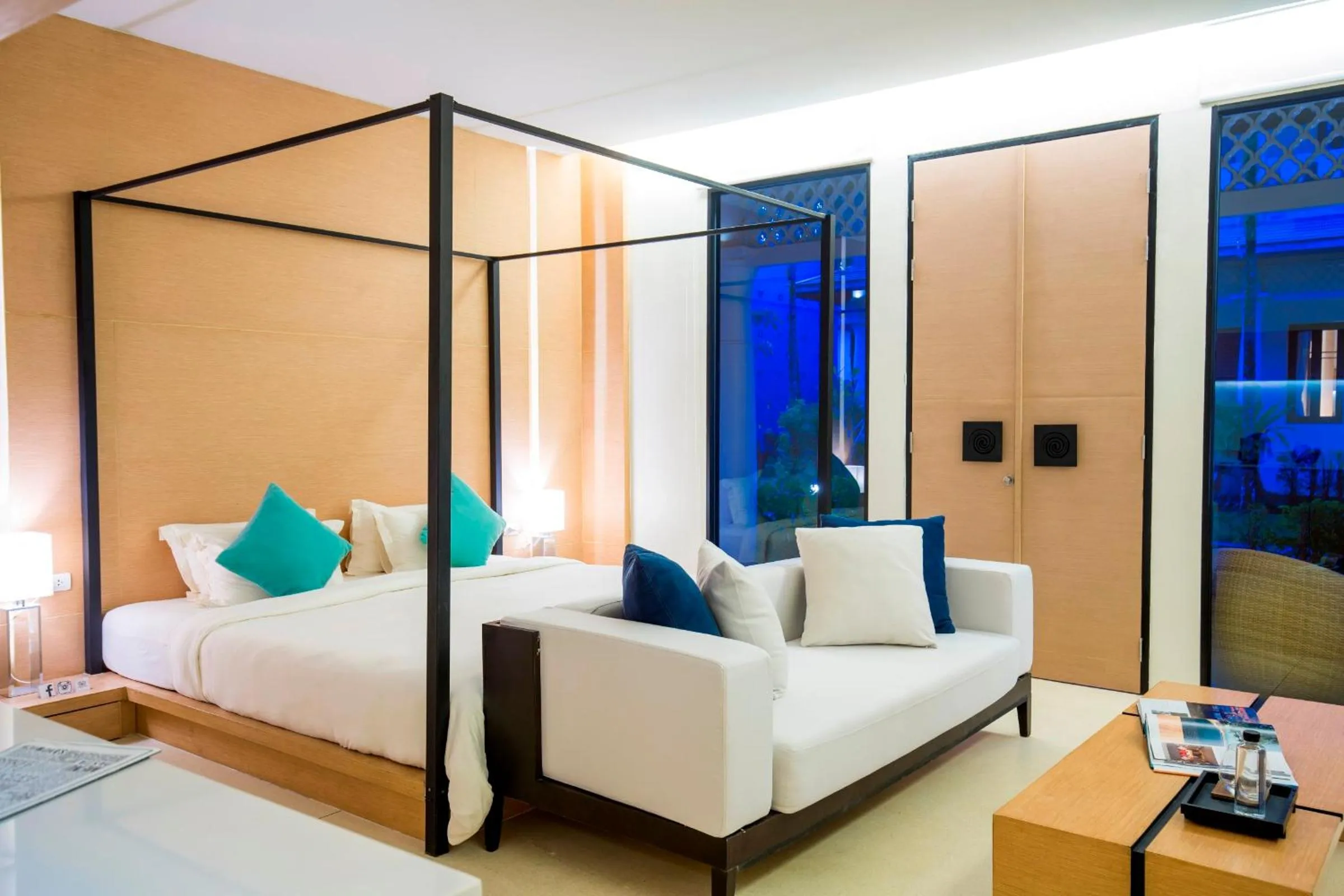 Bed in The Anda Mani Khaolak Beachfront Villas