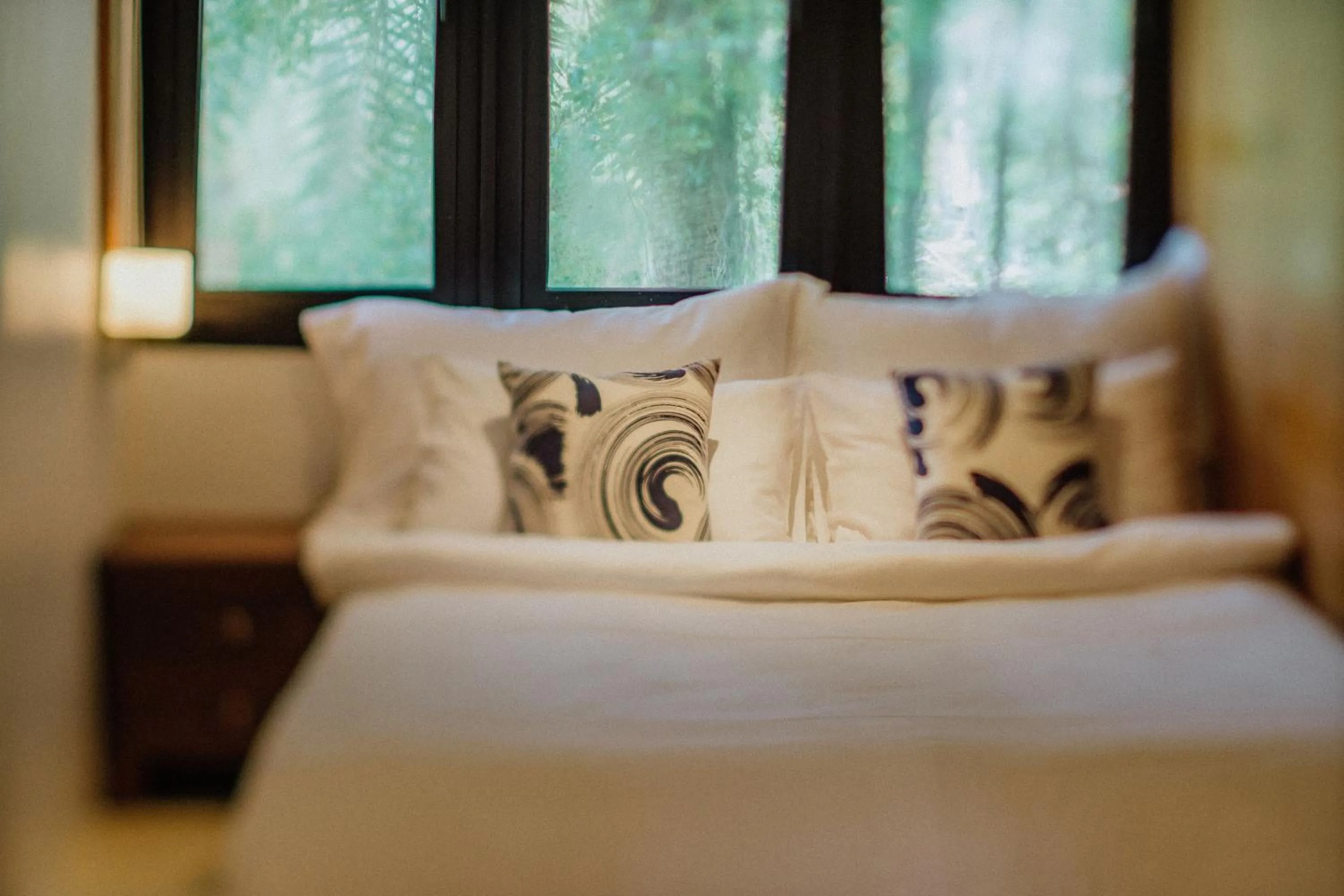 Bed in The Anda Mani Khaolak Beachfront Villas