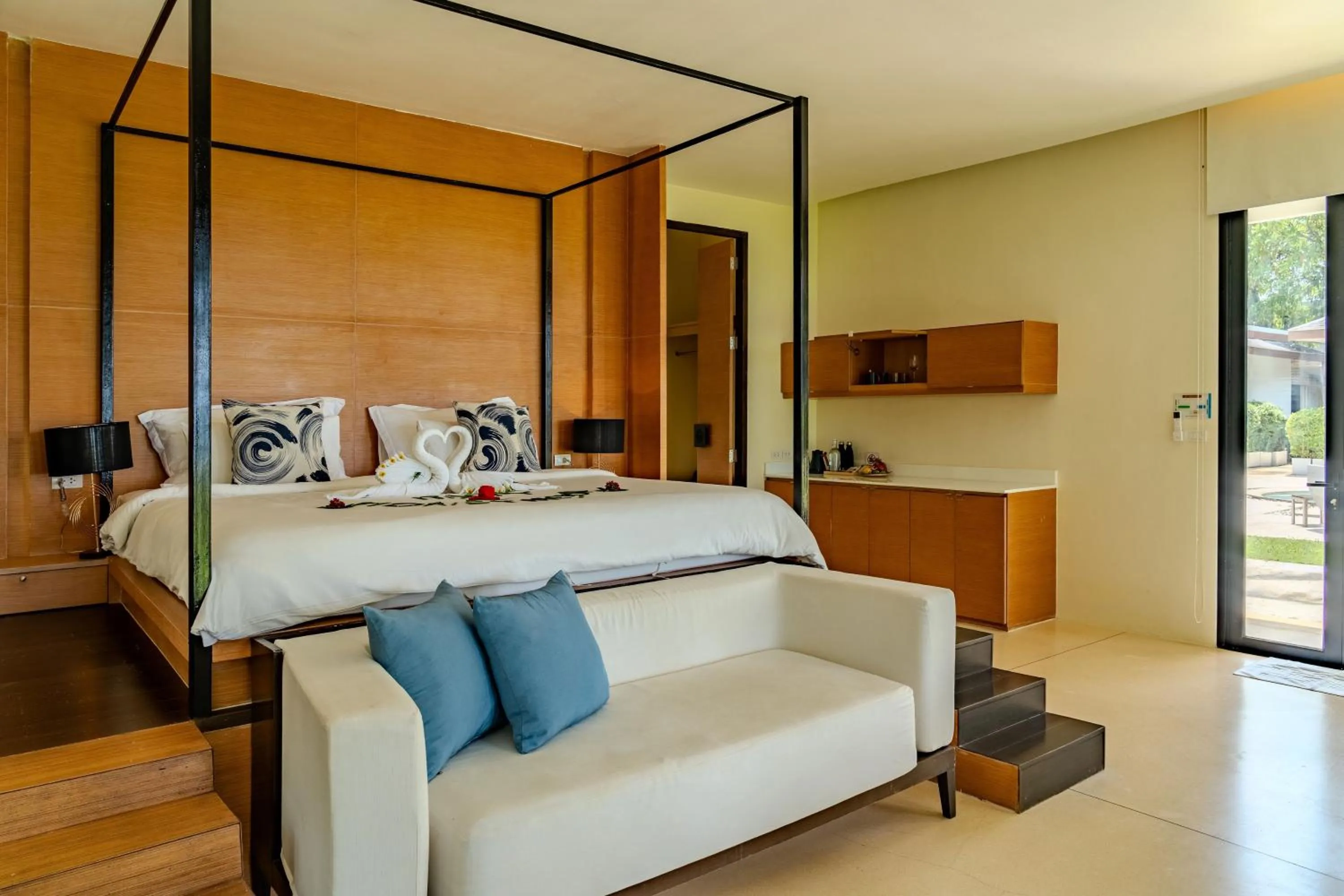 Bed in The Anda Mani Khaolak Beachfront Villas
