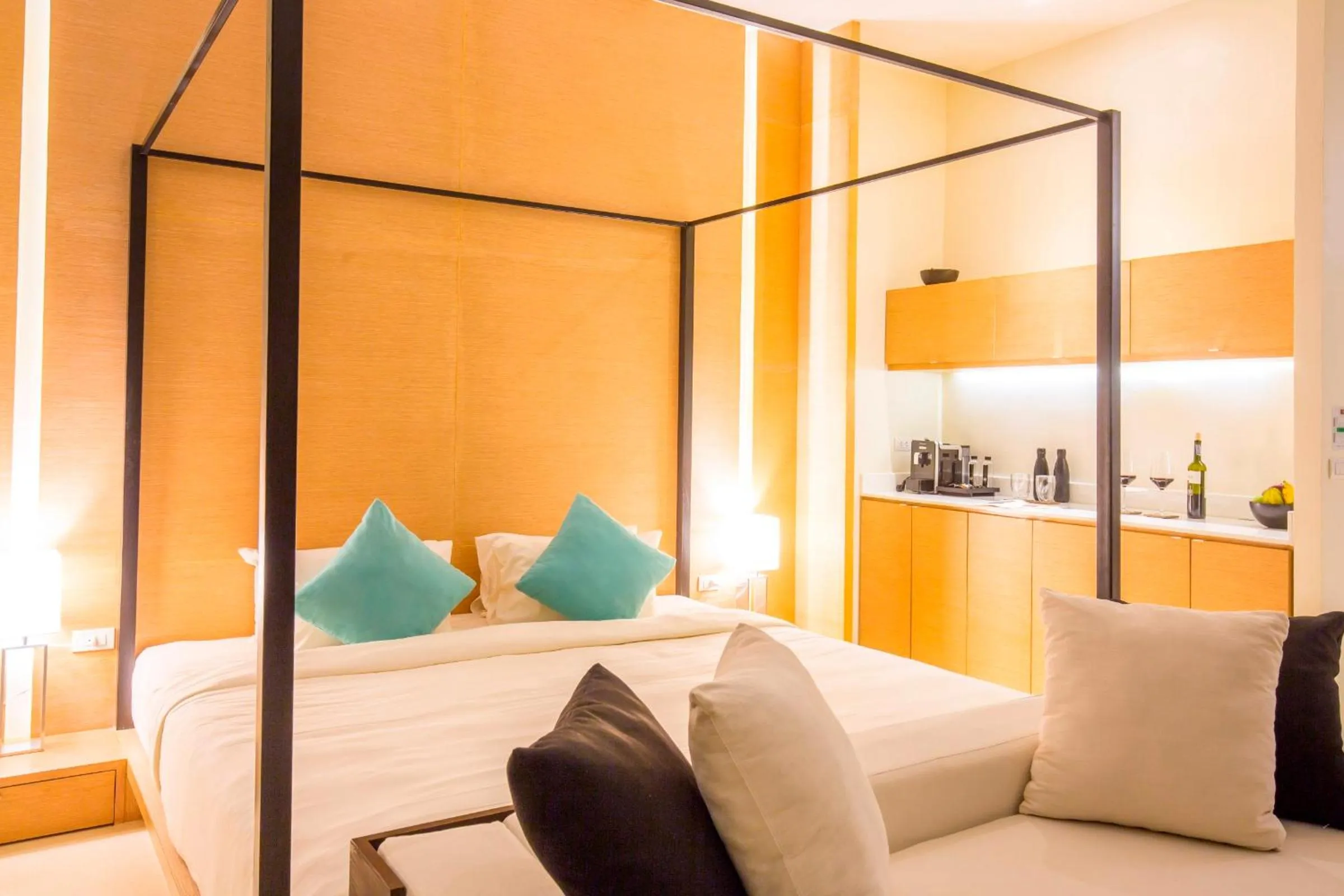 Bed in The Anda Mani Khaolak Beachfront Villas