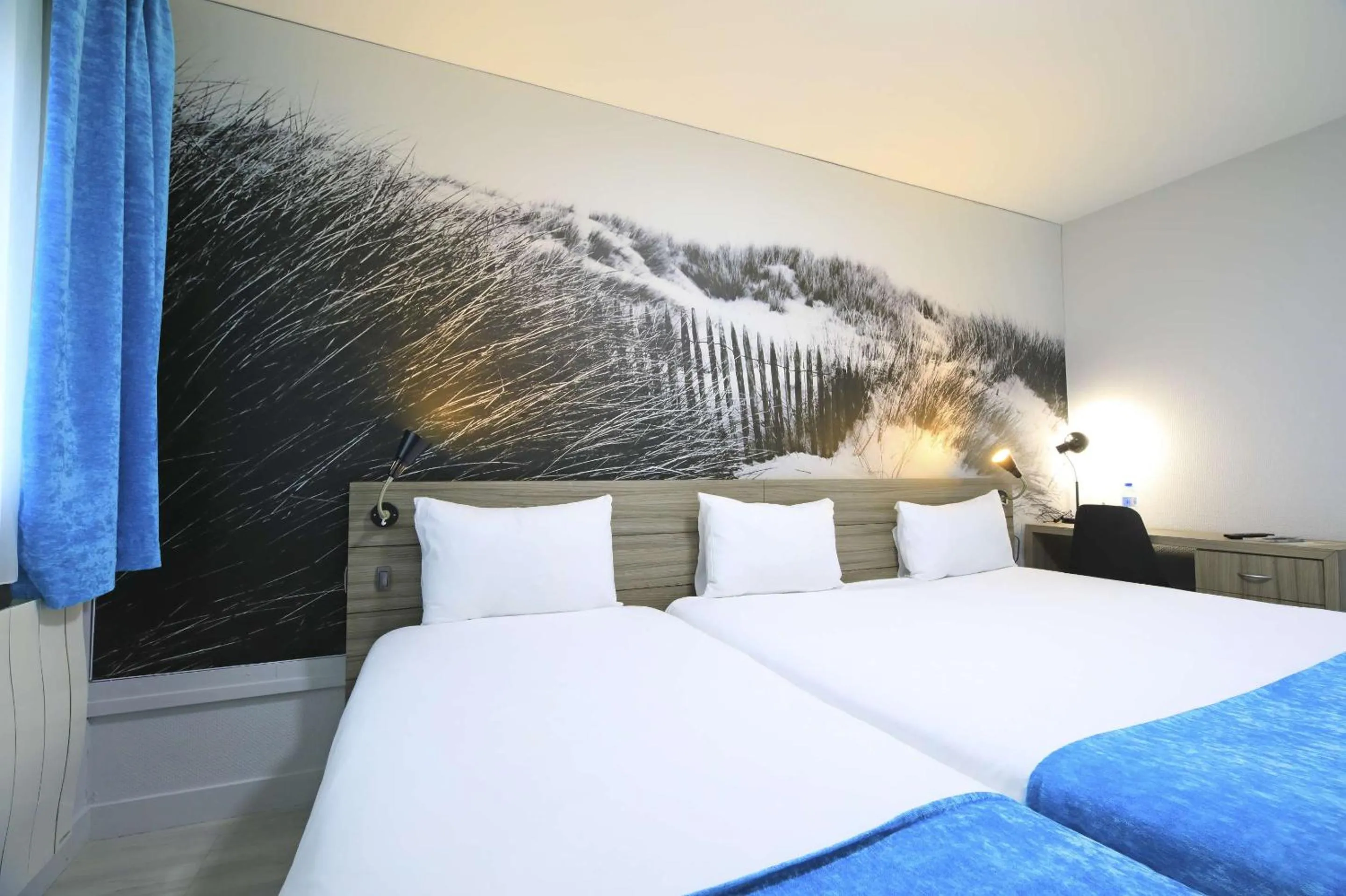 Bedroom in Brit Hotel Le Polder