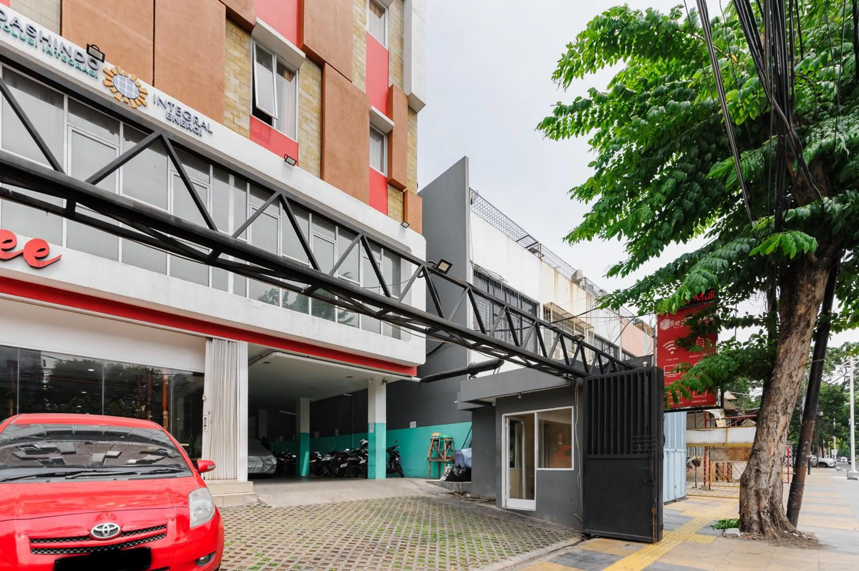 Facade/entrance in RedDoorz Plus near Mall Ciputra Jakarta