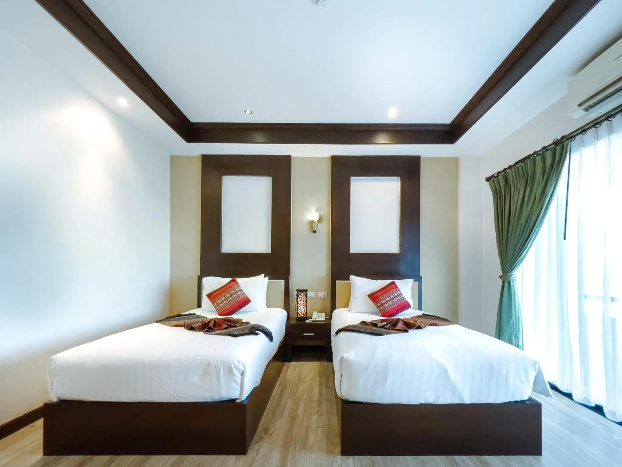 Bed in Royal Nakhara Hotel and Convention Centre