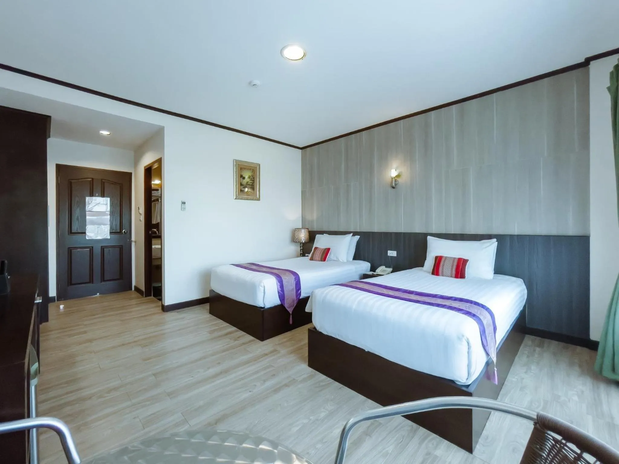 Bed in Royal Nakhara Hotel and Convention Centre