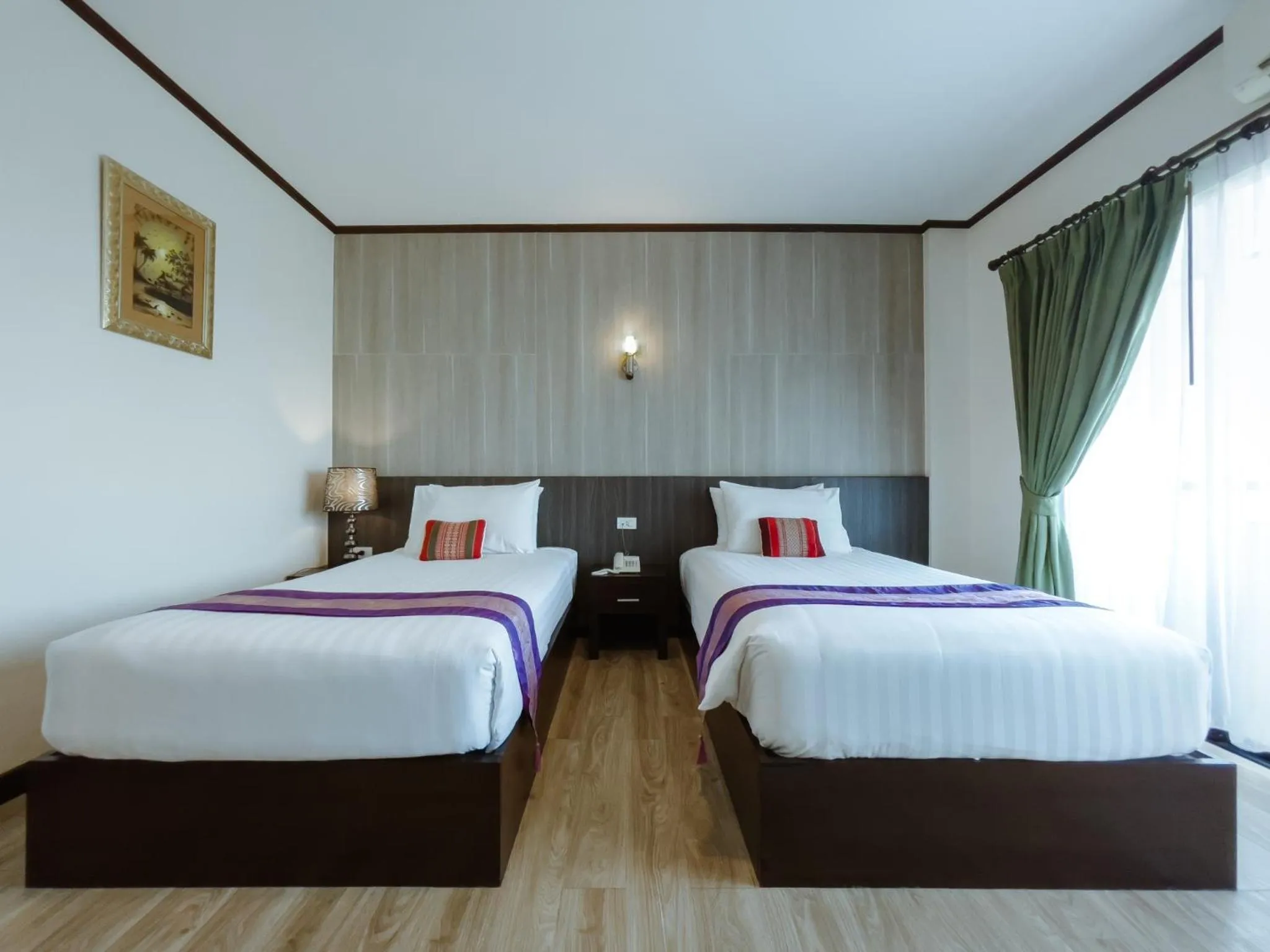 Bed in Royal Nakhara Hotel and Convention Centre