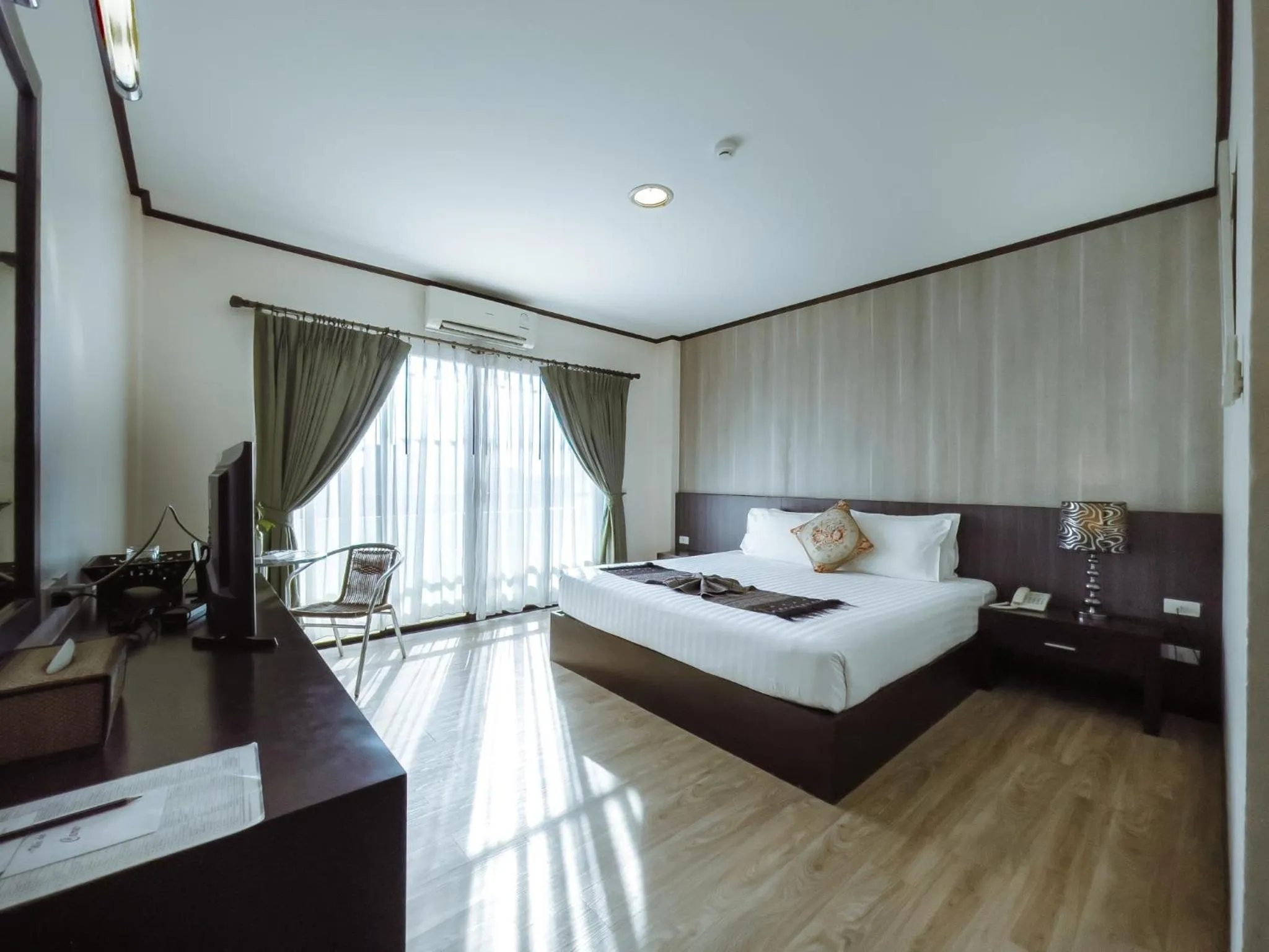 Bed in Royal Nakhara Hotel and Convention Centre