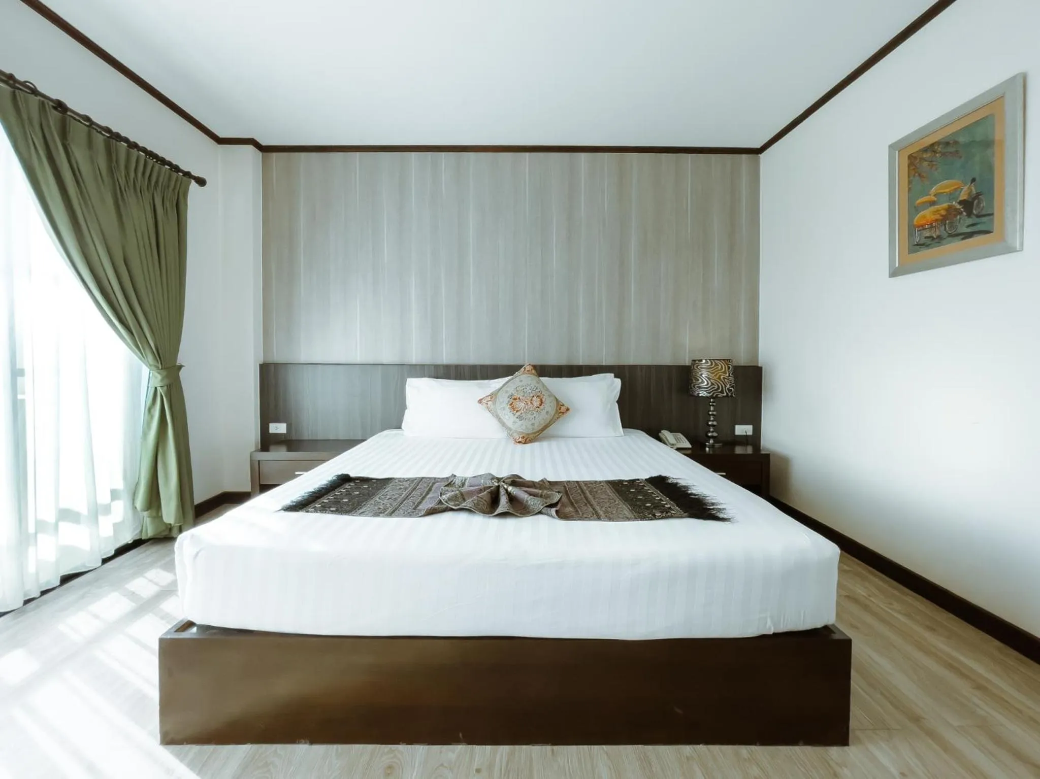 Bed in Royal Nakhara Hotel and Convention Centre