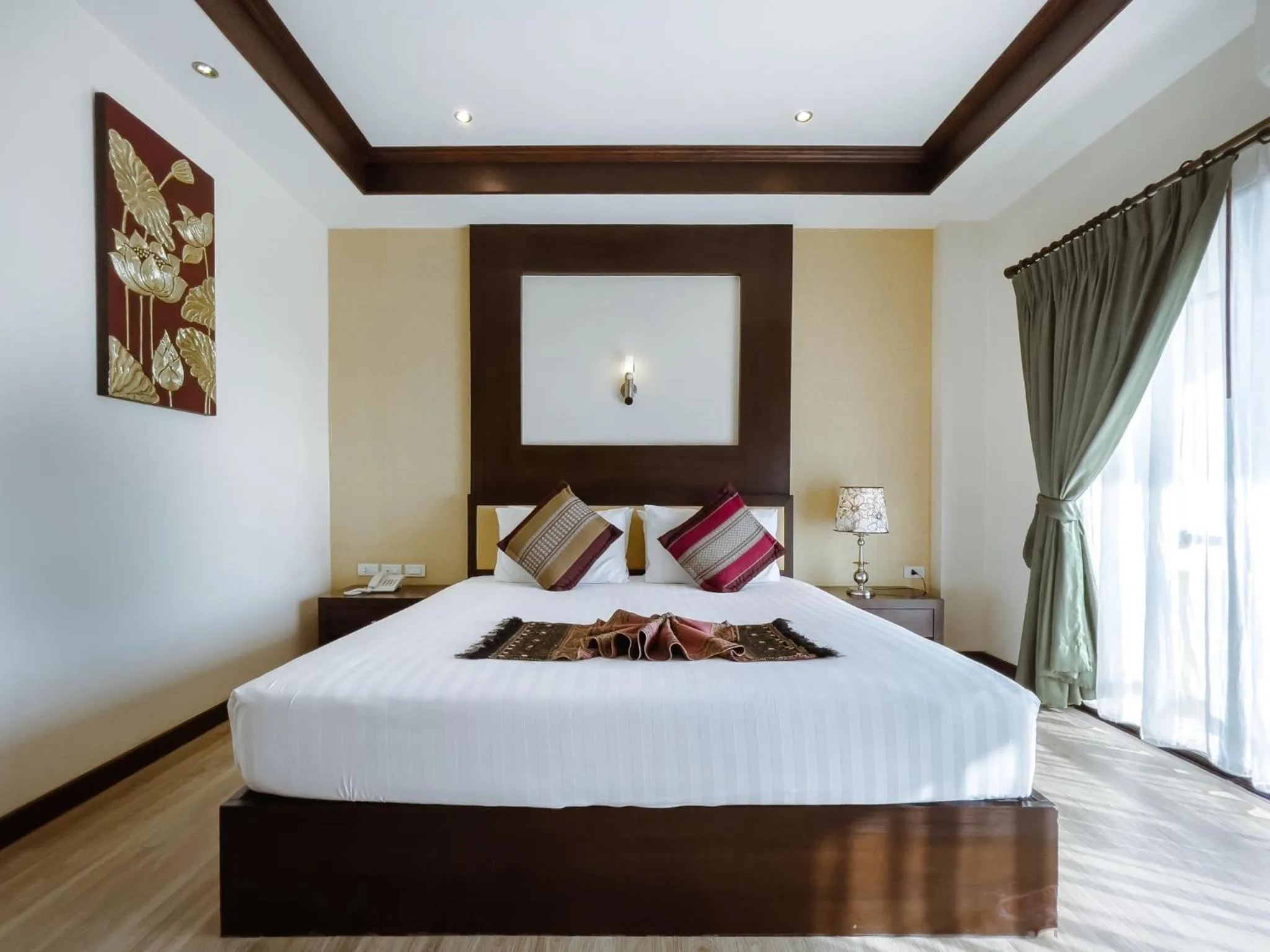 Bed in Royal Nakhara Hotel and Convention Centre