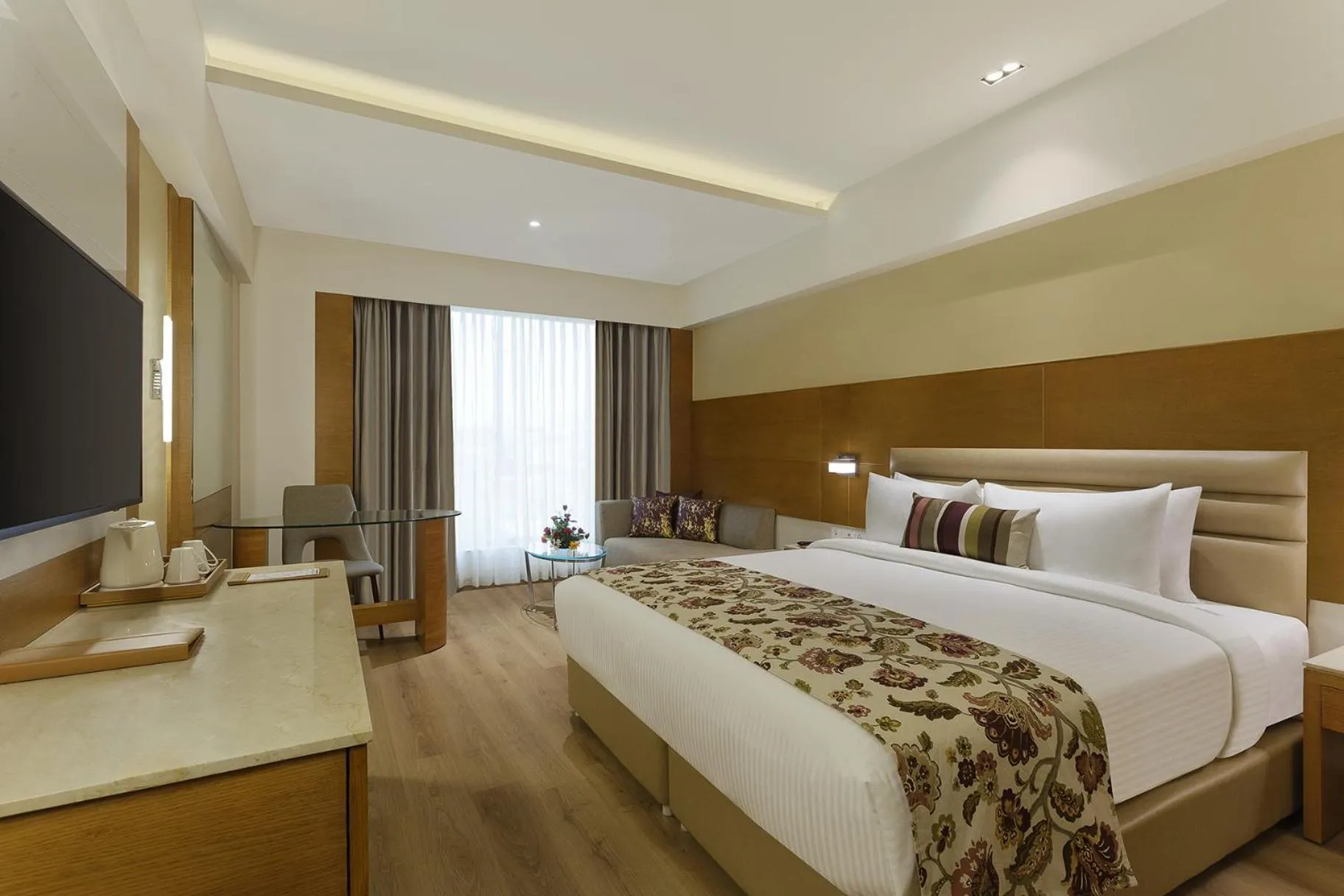 Bed in Nataraj Sarovar Portico