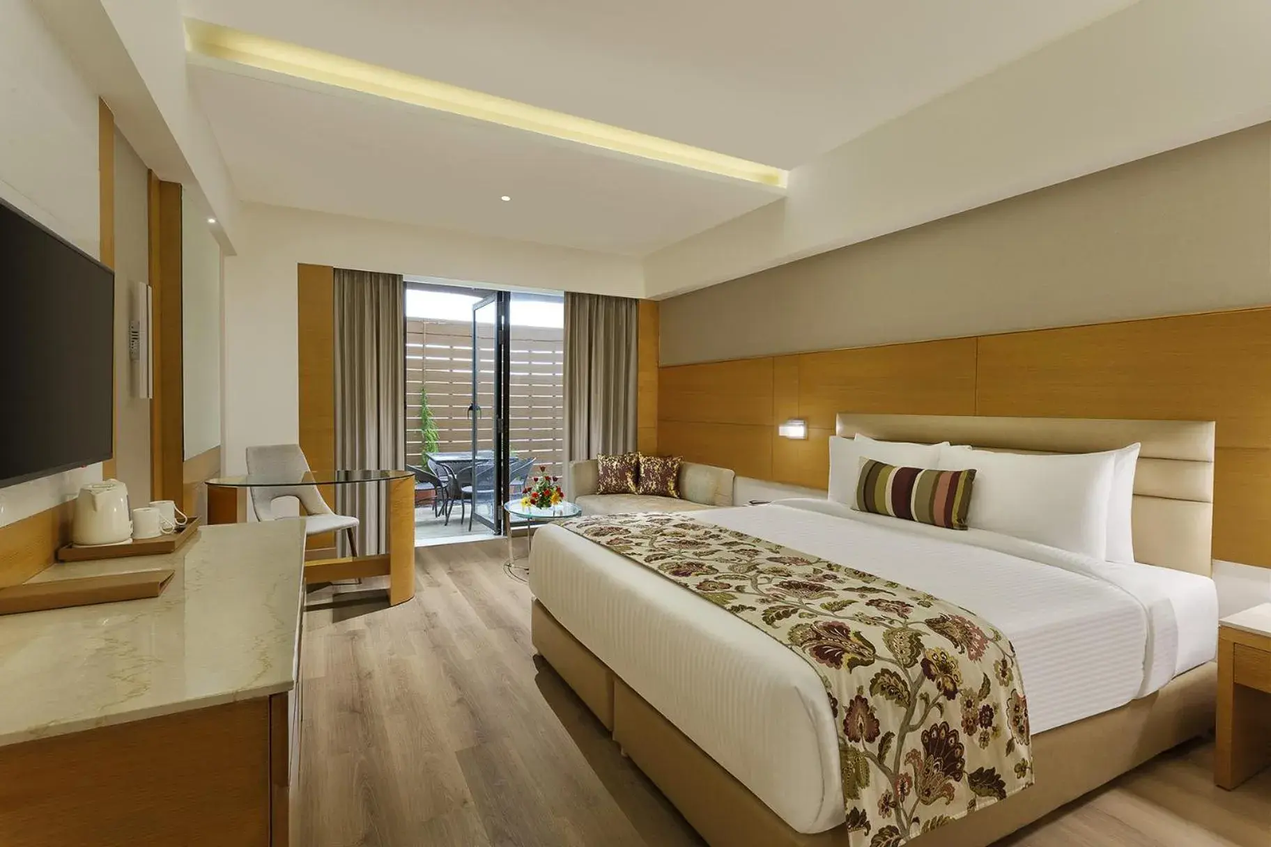 Deluxe Room - single occupancy - King Size Bed in Nataraj Sarovar Portico Deluxe Room - single occupancy - King Size Bed in Nataraj Sarovar Portico