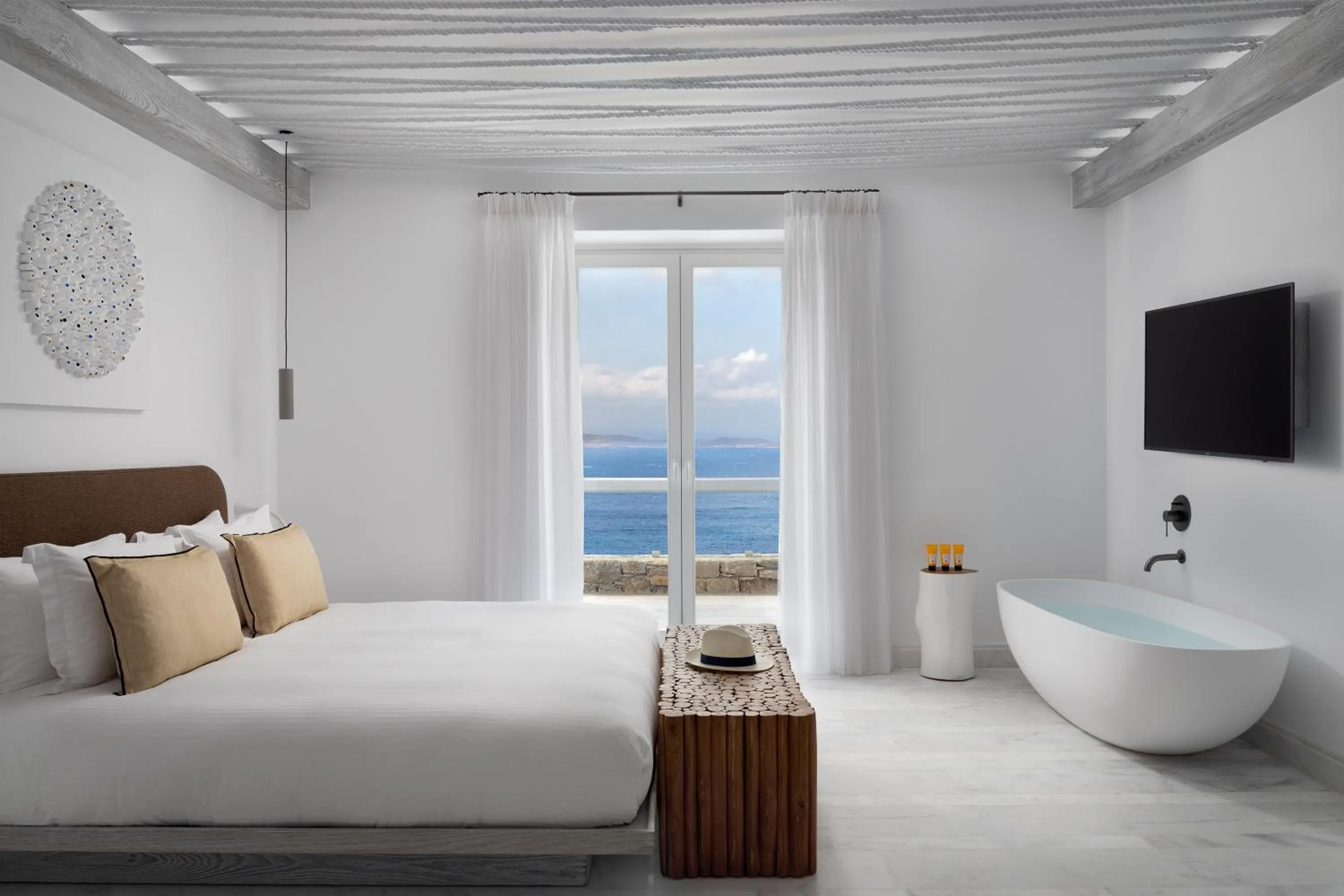 Bed in Mykonos Riviera Hotel & Spa, a member of Small Luxury Hotels of the World