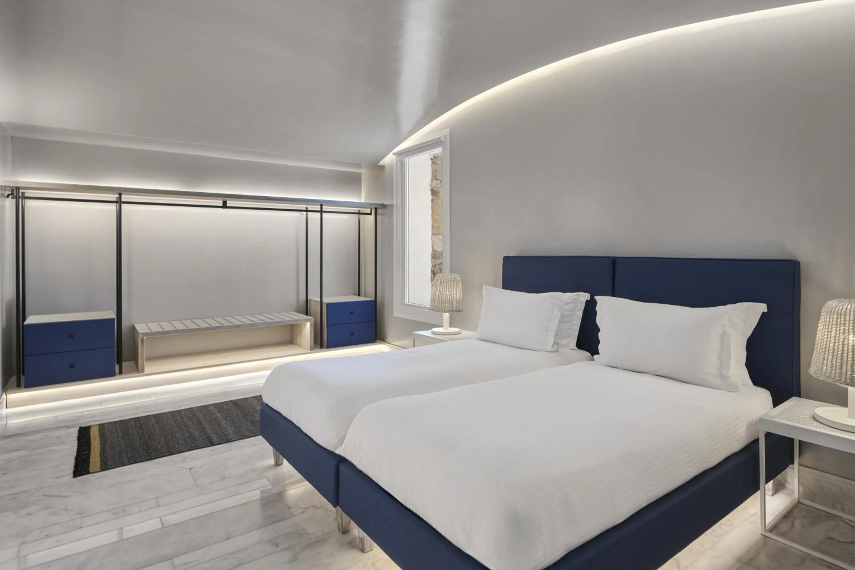 Bed in Mykonos Riviera Hotel & Spa, a member of Small Luxury Hotels of the World