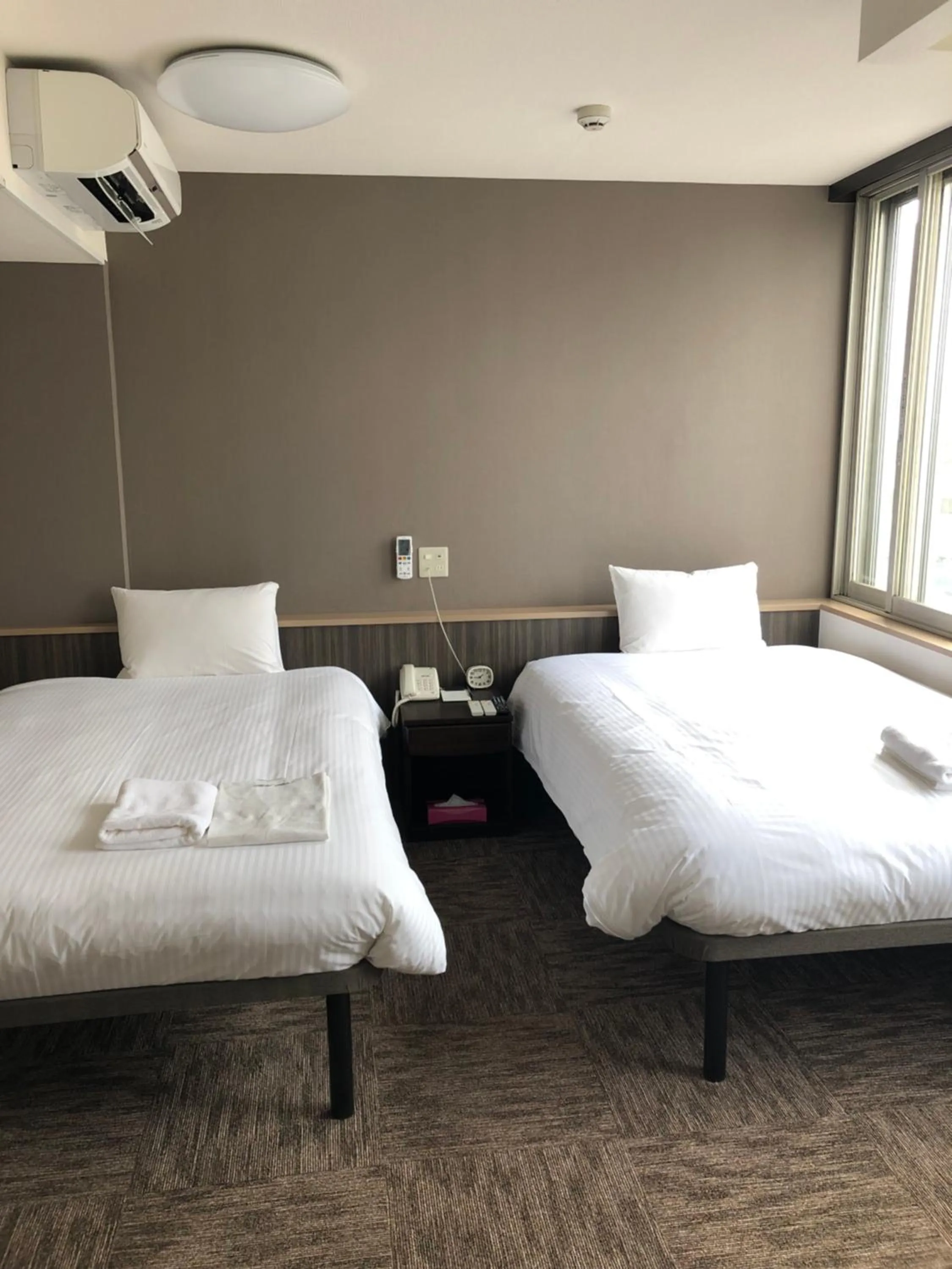 Photo of the whole room, Bed in Hotel Tetora Asahikawa Station