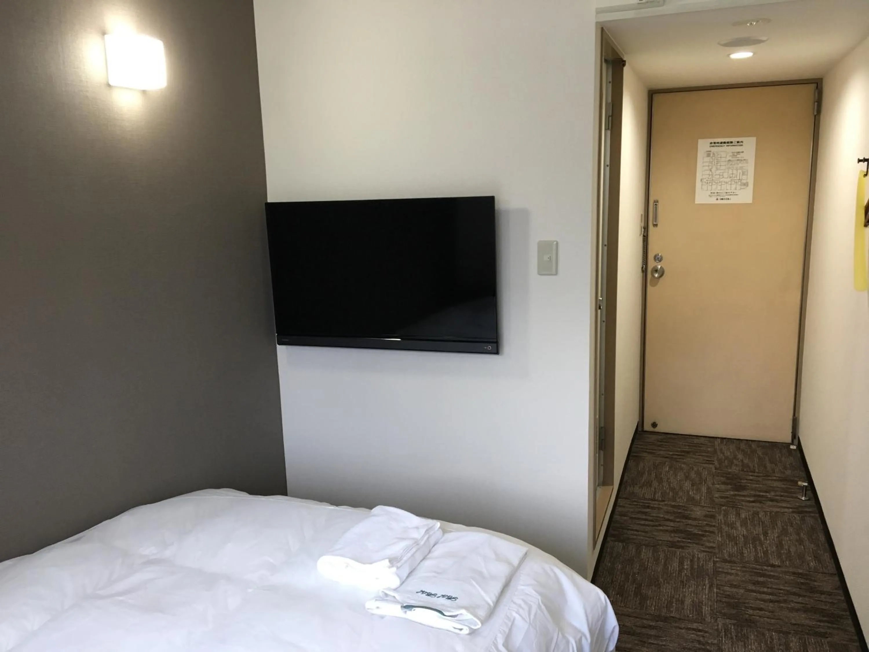 Photo of the whole room, Bed in Hotel Tetora Asahikawa Station