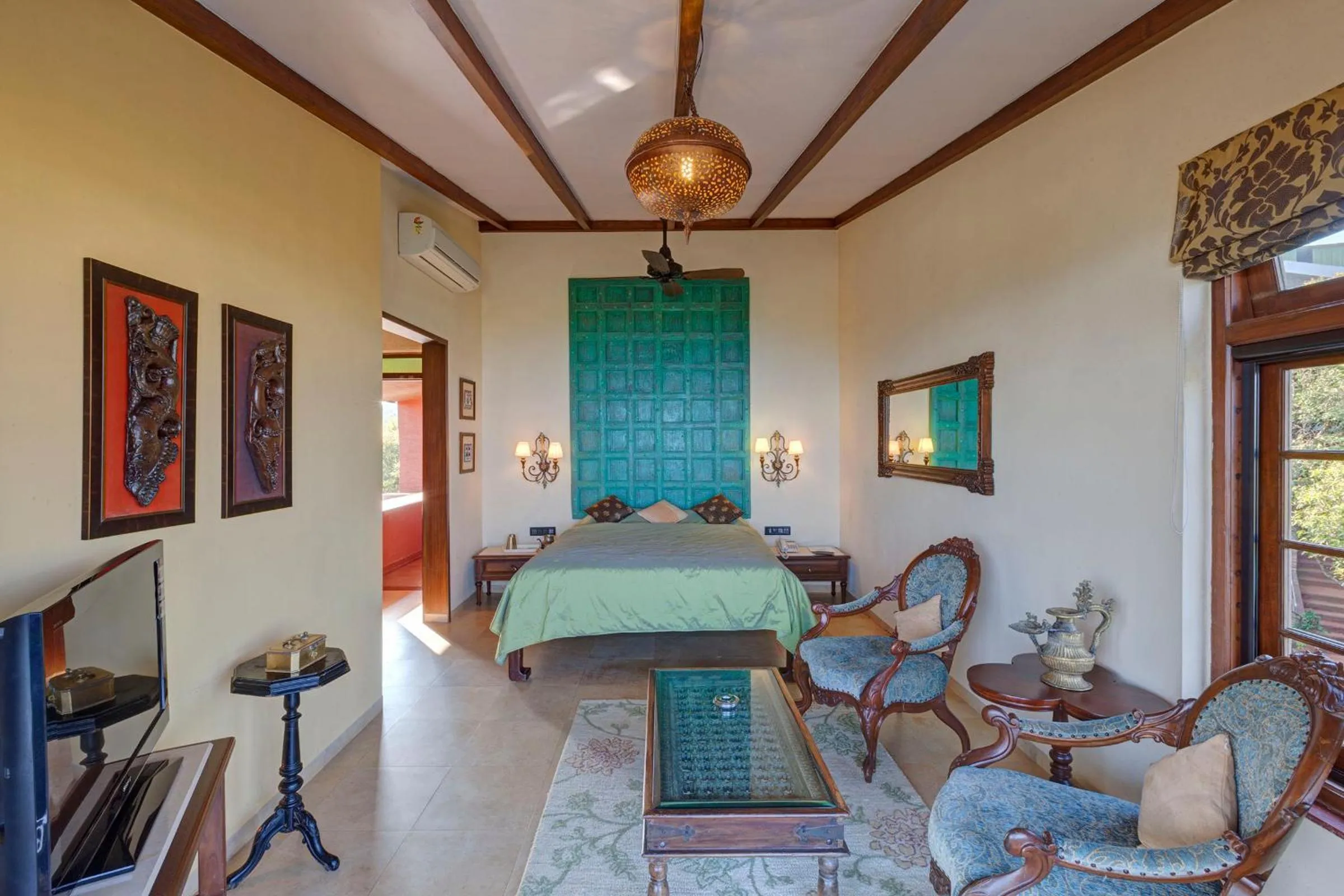 Bed in Ramsukh Resorts and Spa