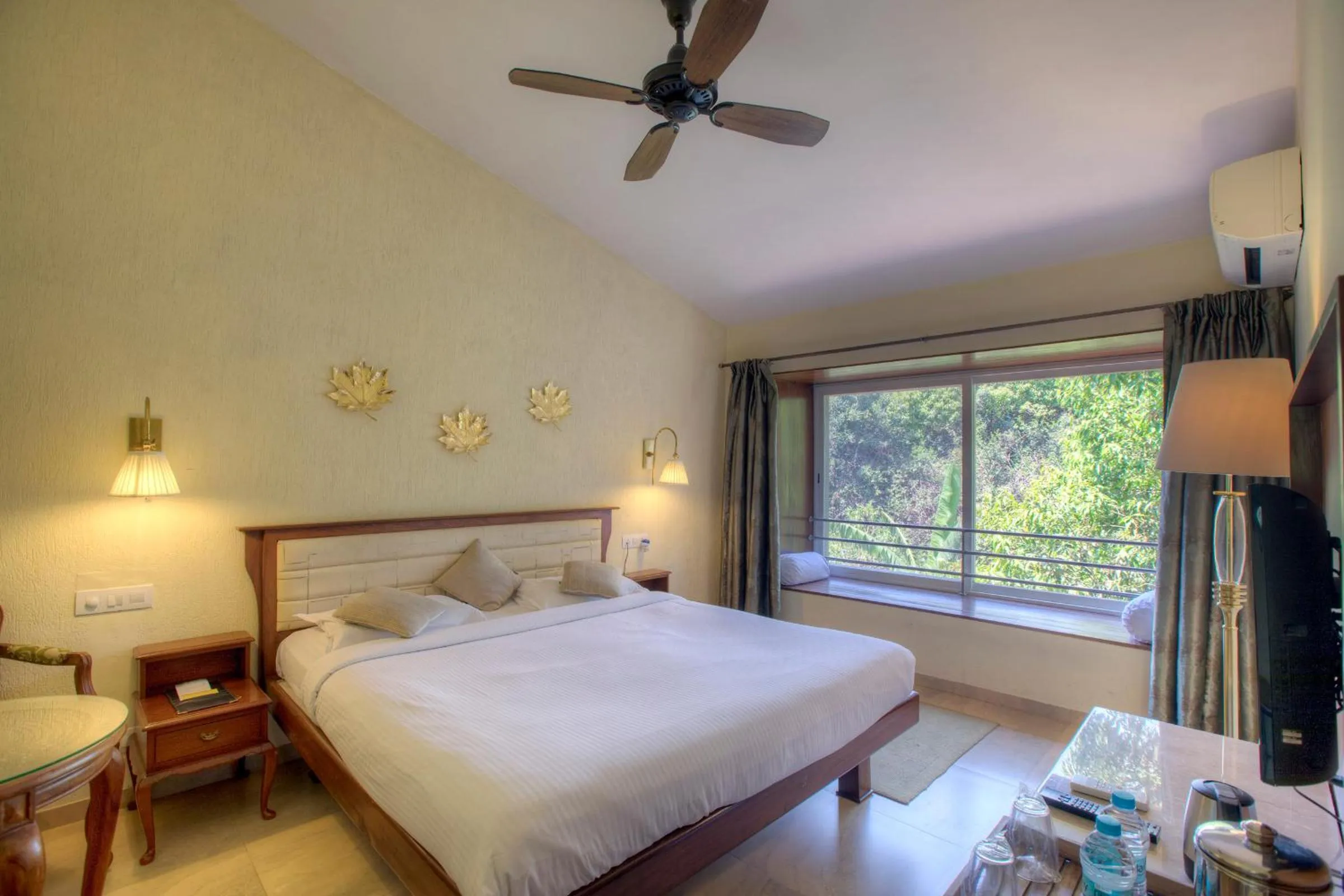 Bed in Ramsukh Resorts and Spa