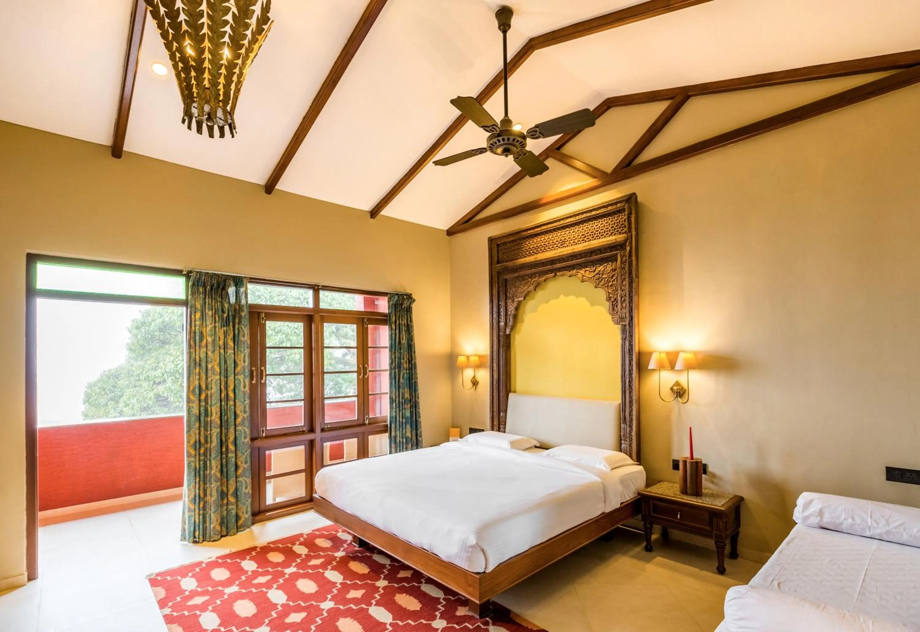 Bed in Ramsukh Resorts and Spa