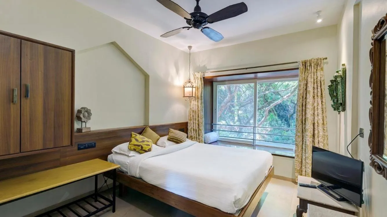 Bed in Ramsukh Resorts and Spa