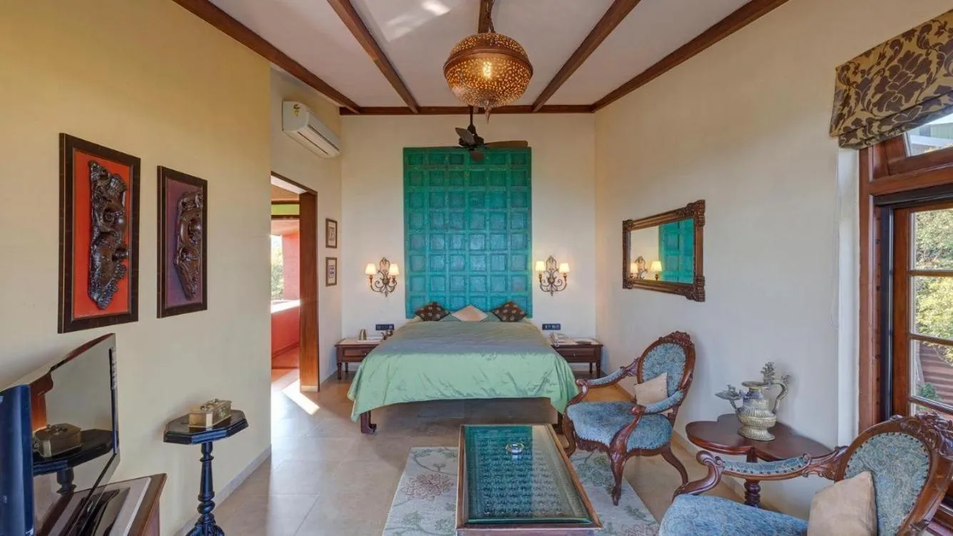 Bed in Ramsukh Resorts and Spa