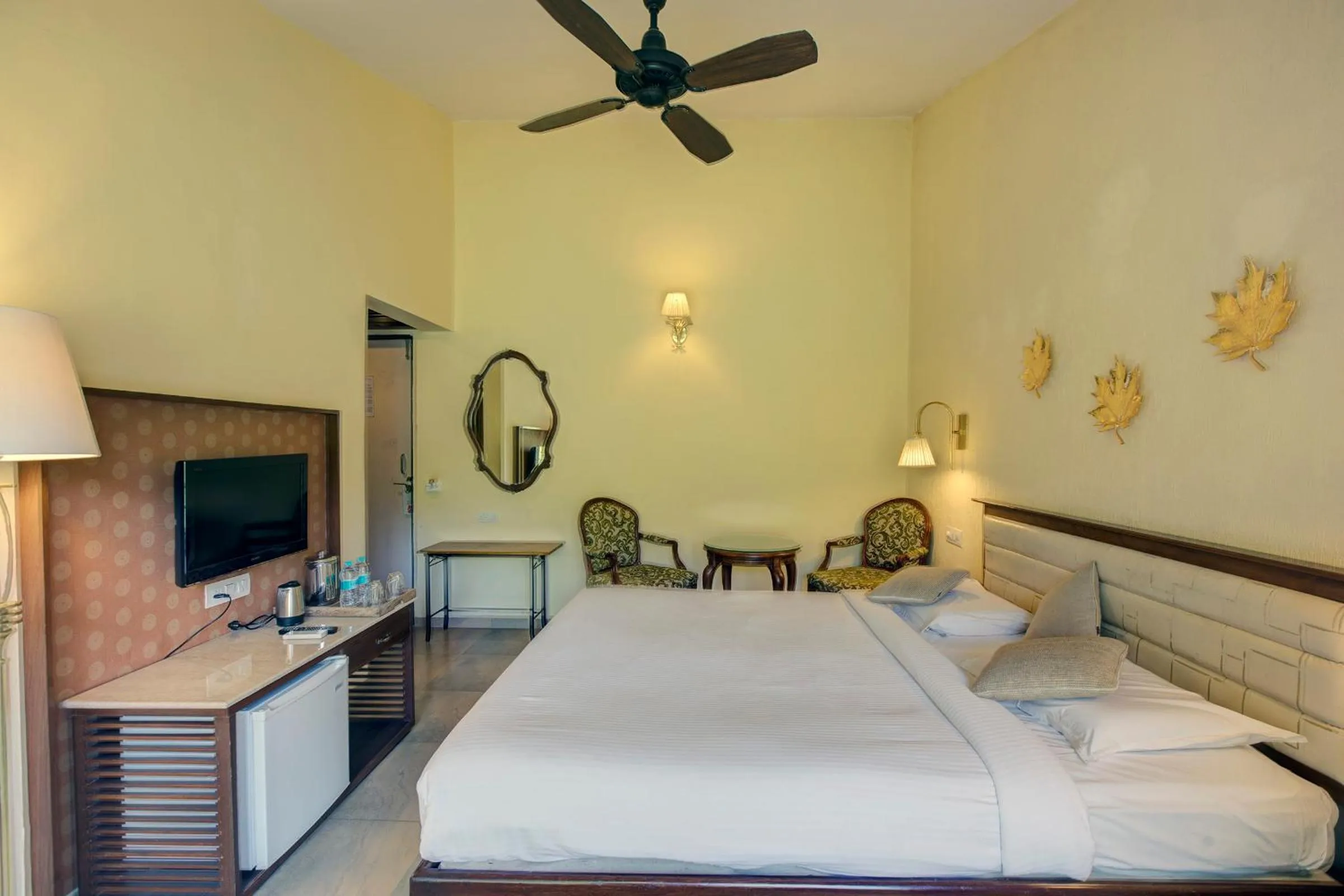 Bed in Ramsukh Resorts and Spa