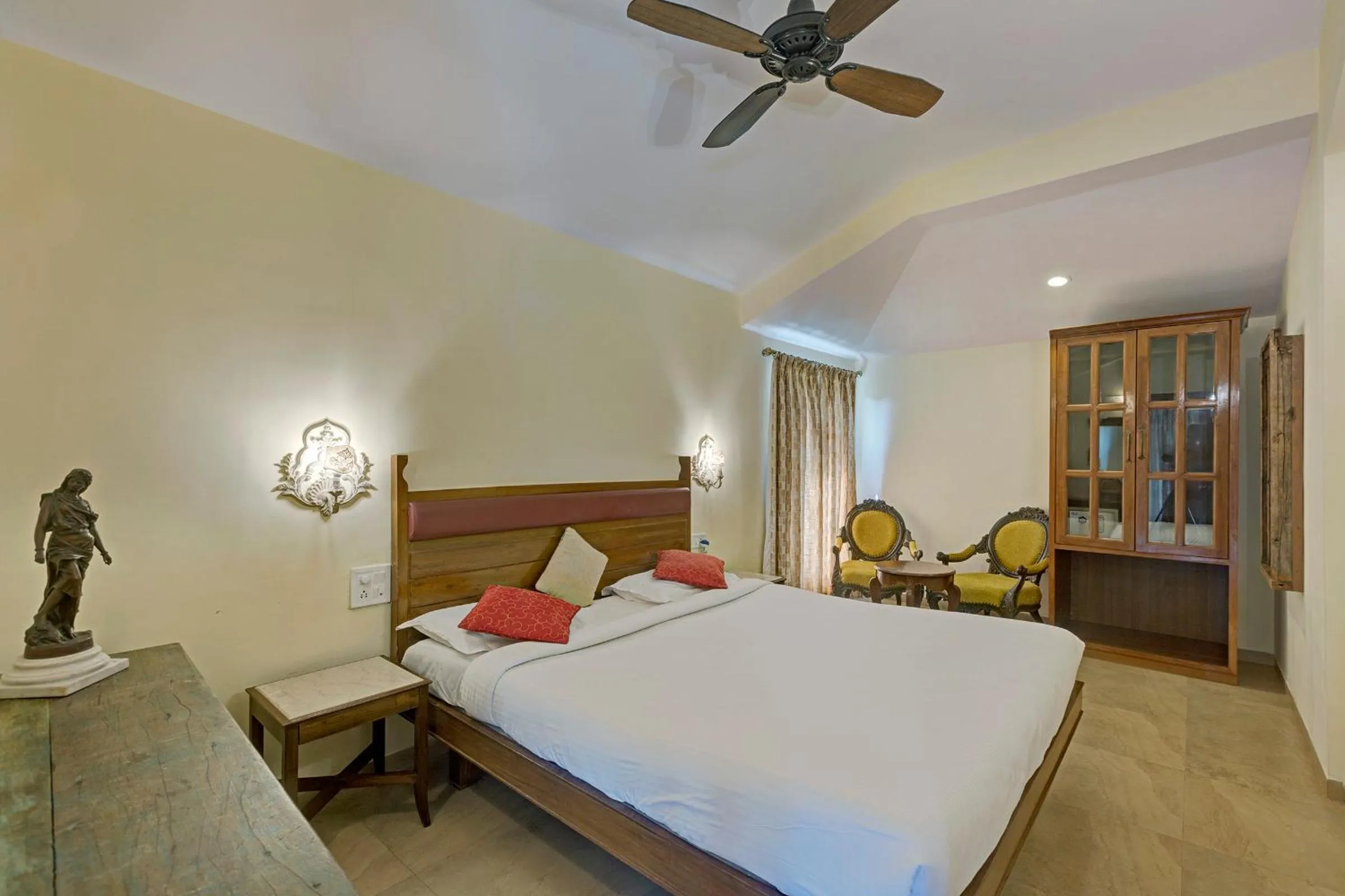 Bed in Ramsukh Resorts and Spa