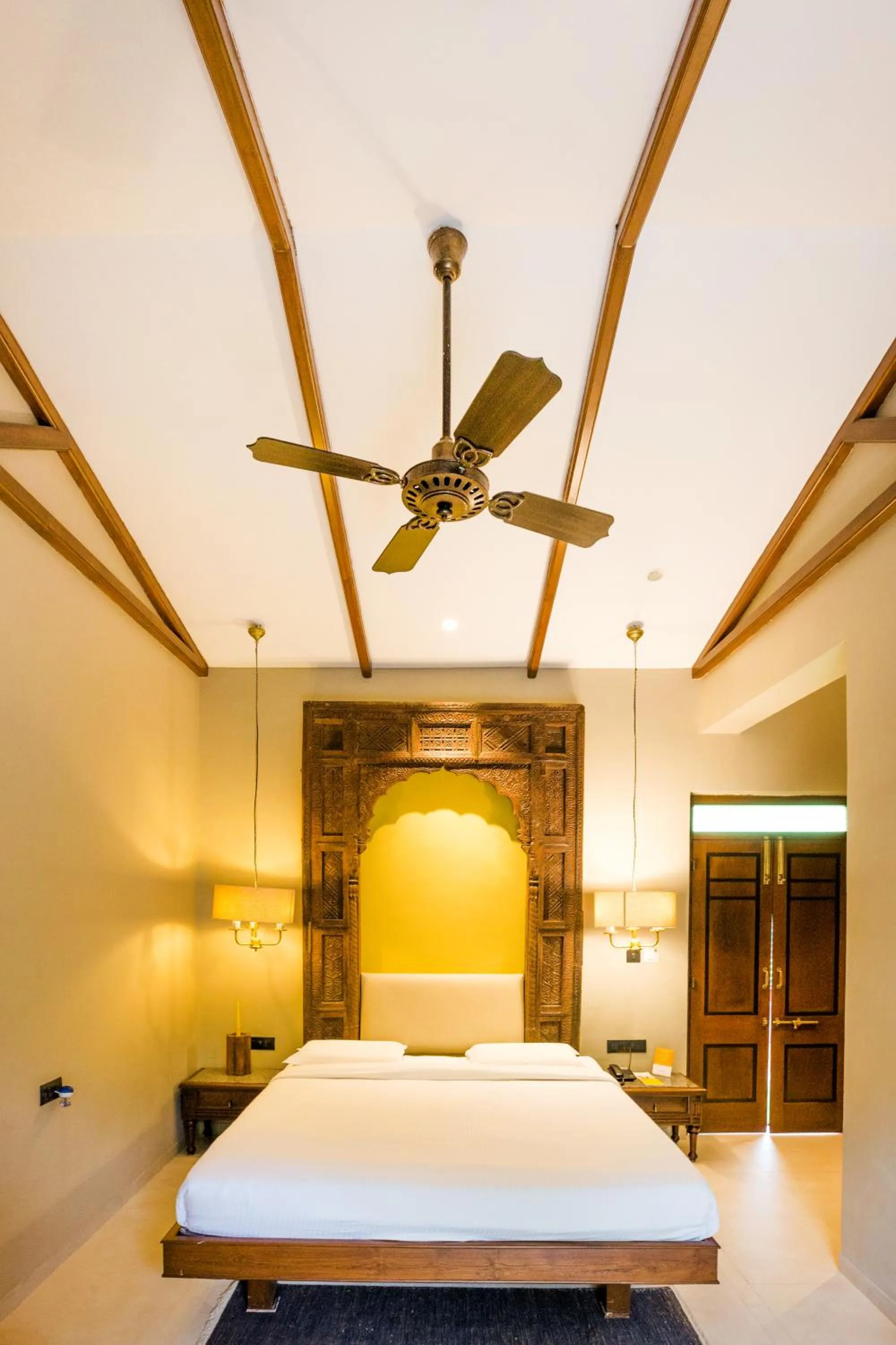 Bed in Ramsukh Resorts and Spa