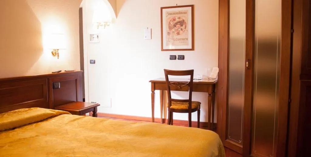 Bed in Villa Chiara Hotel